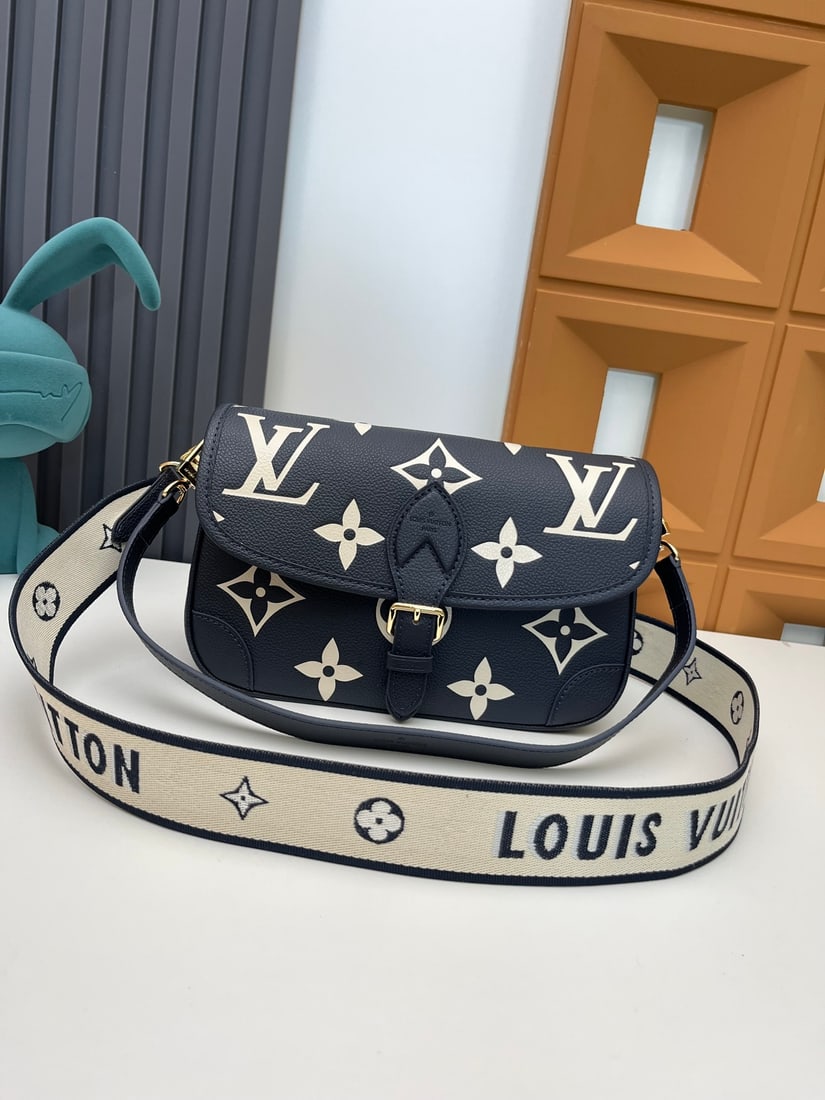 Diane handbags: We offer FREE SHIPPING for both domestic and international clients who bid over $500. This Diane handbag is crafted from Louis Vuitton's classic Monogram Empreinte embossed leather, featuring the bran
