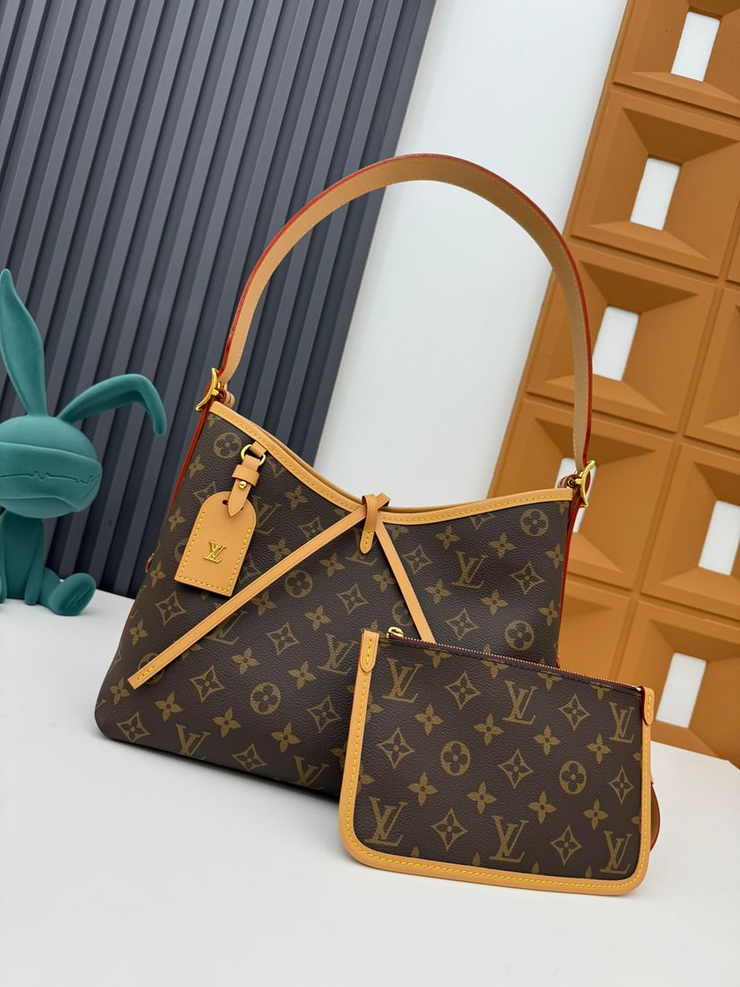 CarryAll Small Handbag: We offer FREE SHIPPING for both domestic and international clients who bid over $500. The CarryAll small handbag is crafted from Monogram canvas with leather trim. It features a neat interior. The