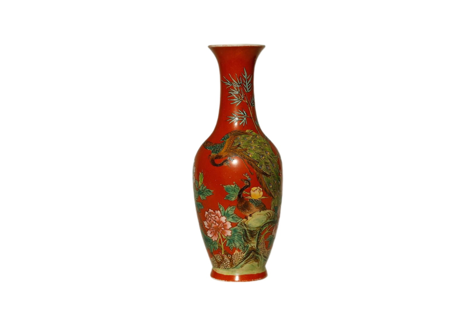 Republic FAMILLE ROSE VASE WITH PHOENIX AND PEONY: A SUPERLATIVE CORAL?GROUND FAMILLE ROSE VASE WITH PHOENIX AND PEONY DECORATION. Republic of China Period, Early 20th CenturyHeight:25.5cmDescription: Gracefully potted with a slender baluster body ris