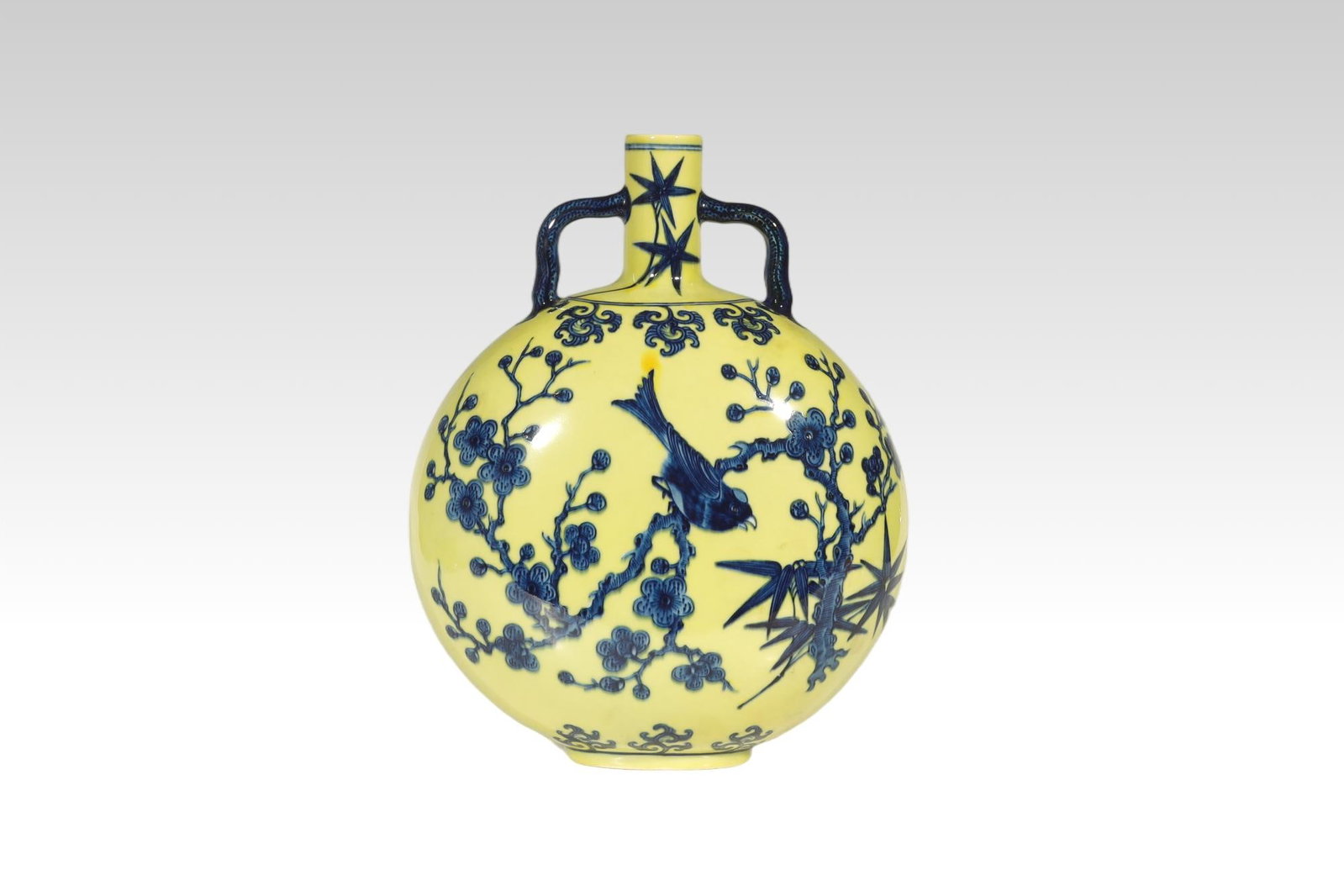 Qing Dynasty RARE YELLOW-GROUND BLUE-AND-WHITE MOONFLASK: AN EXCEPTIONALLY FINE AND RARE YELLOW-GROUND BLUE-AND-WHITE 'THREE FRIENDS AND MAGPIE' MOONFLASK Qing Dynasty, Yongzheng Period (1723–1735)Height:31.5cm. Description: Bearing a Six-Character Yongzhe