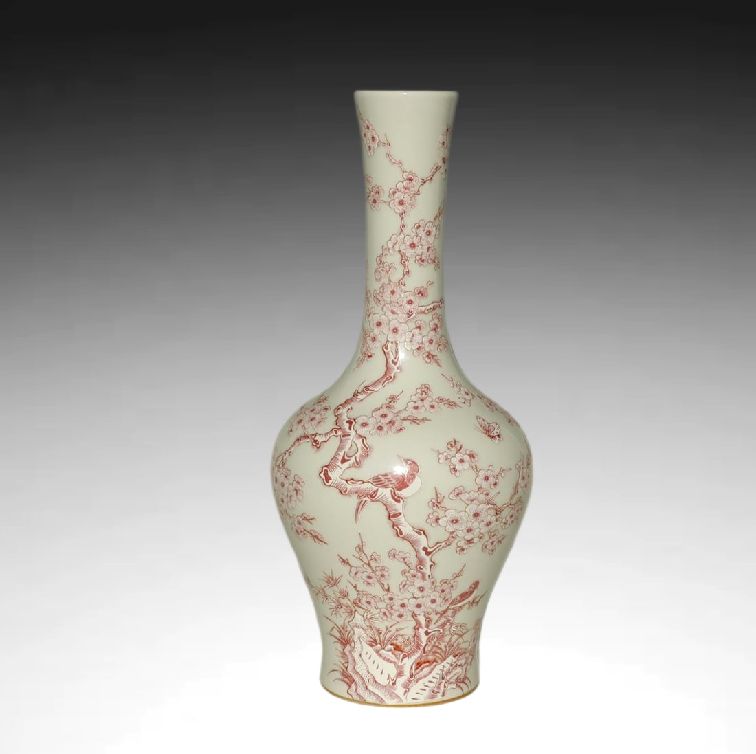 Qing Dynasty UNDERGLAZE COPPER-RED VASE: A FINE AND ELEGANT UNDERGLAZE COPPER-RED VASE DEPICTING MAGPIES AMONG PLUM BLOSSOM AND BAMBOOQing Dynasty, Kangxi Period (1662–1722)Height:30cmDescription: This long-neck vase (changjing ping) is pa
