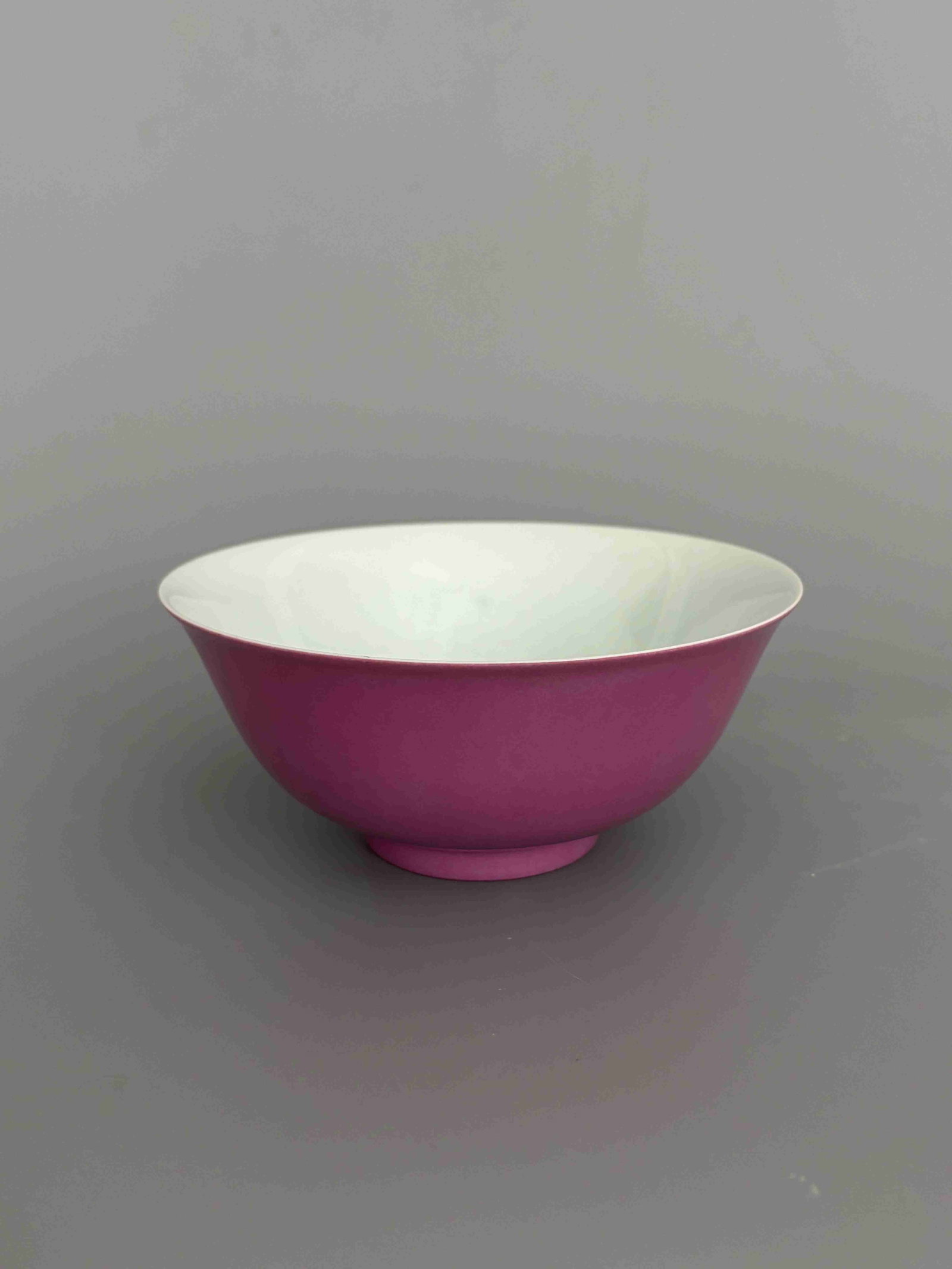 Qing Qianlong Rouge-Red-Glazed Bowl: Qing Qianlong Rouge-Red-Glazed BowlQing Dynasty, Qianlong Period, 1736-1795Height: 6.9cm Mouth Diameter: 15.6cm Base: 6cmDescription: A bowl of gently rounded form rising from a straight foot, the ext