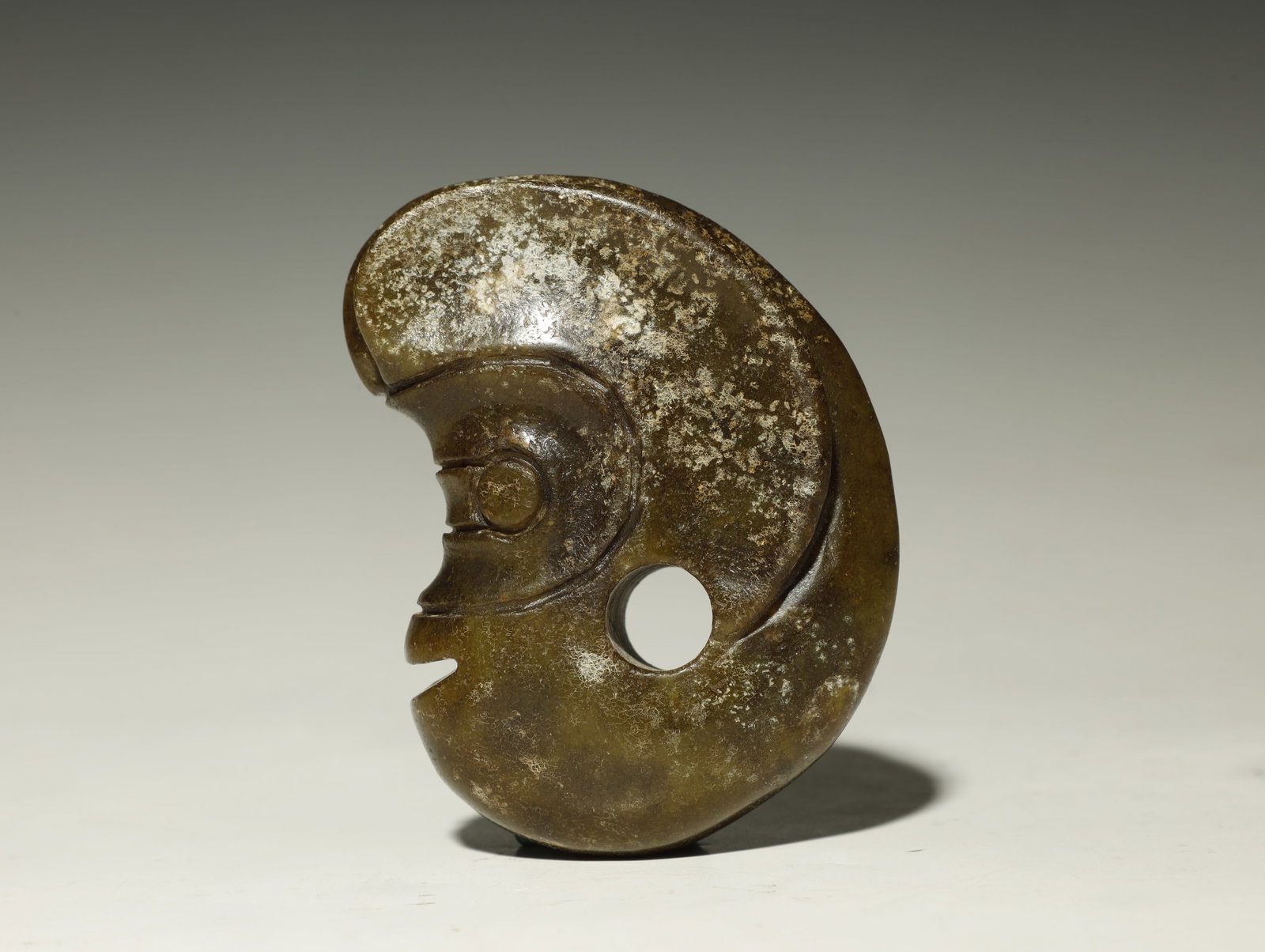 Chinese - Neolithic Jade Pig Dragon (Zhulong): A RARE JADE PIG DRAGON (ZHULONG)Neolithic Period, Hongshan Culture, circa 3500–2500 BCEHeight 8 cm × Length 6 cm × Width 2.6 cmDescription: Expertly carved from translucent pale celadon jade with 