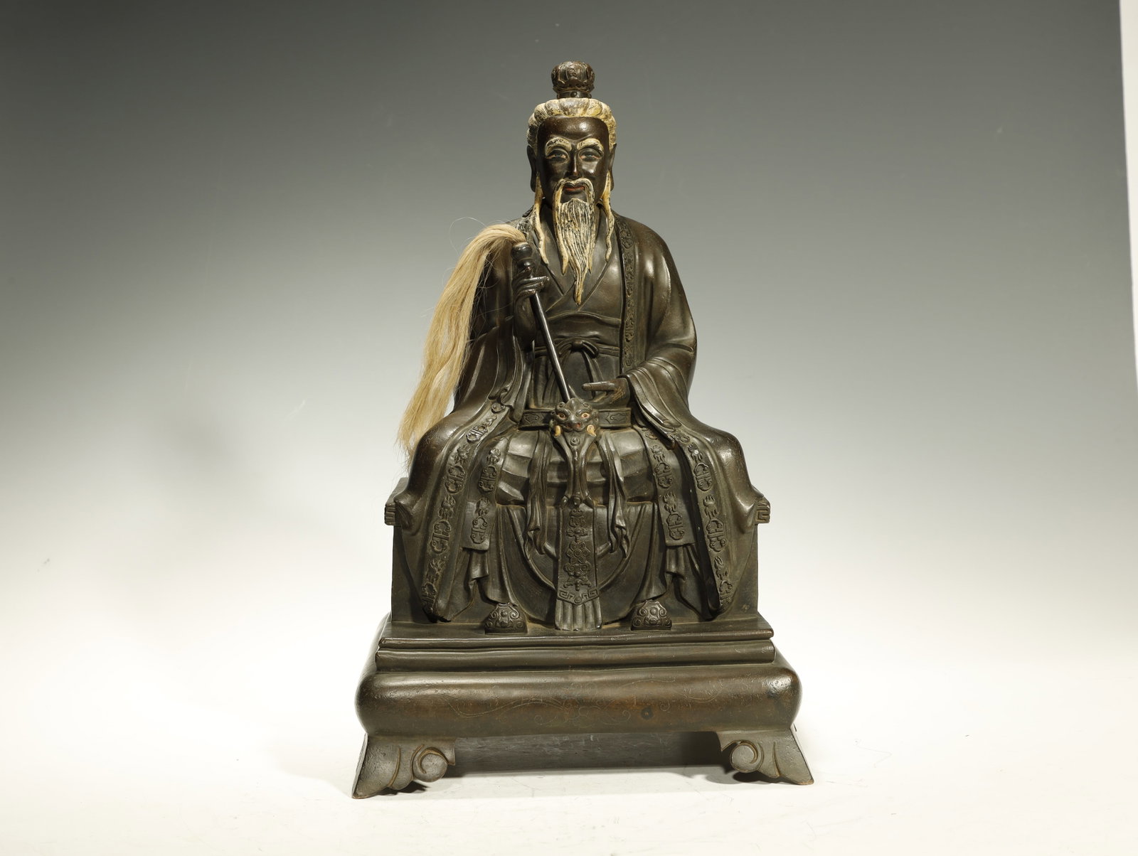 Ming Dynasty Bronze Group of the (Daoist) Three: Bronze Group of the (Daoist) Three Pure Ones with Silver InlayChinese, Ming DynastyHeight 42.5 cm x Length 25.5 cm x Width 21.5 cmDescription: A group of three Daoist deity figures -- the Three Pure O