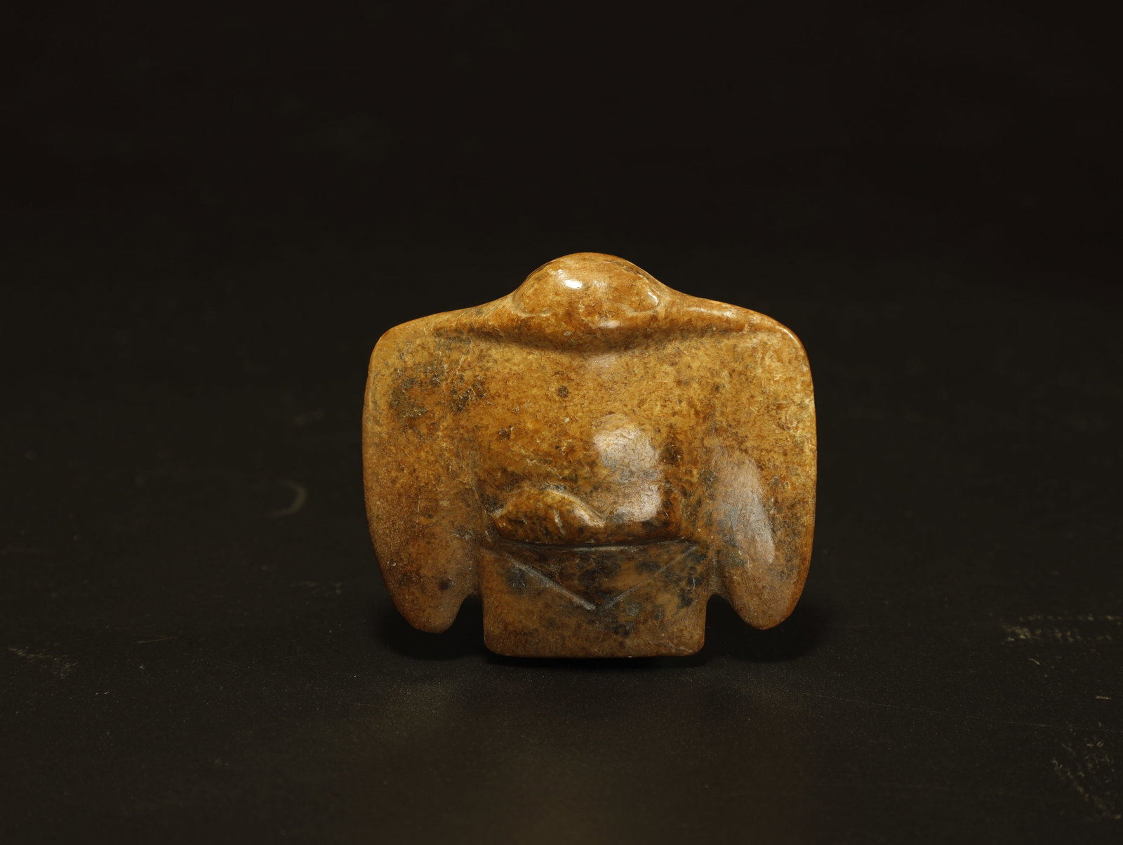 Hongshan (Neolithic) Culture - Jade Celestial Eagle Spirit Guardian Pendant: An Exceptional Hongshan Culture Jade Celestial Eagle Spirit Guardian Pendant. Chinese, Hongshan Culture (circa;3500–3000 BCE) Length 4.7 cm × Width 5.4 cm. Description: Carved from mottled brown ja