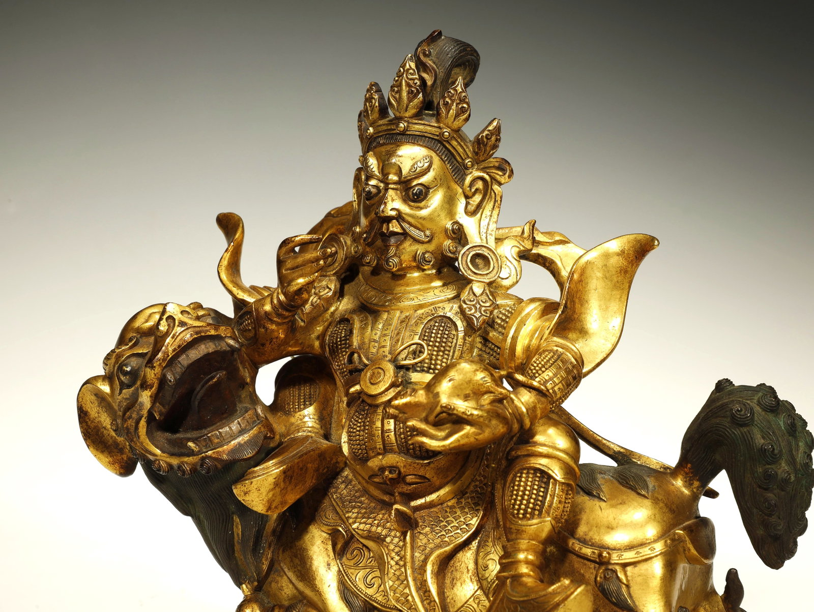 Qing Dynasty Gilt-Bronze Figure of Vaisravana Buddha, God of Wealth: A Magnificent Gilt-Bronze Figure of Vaisravana Buddha, God of Wealth. Chinese/Tibet, Qing Dynasty. Height 21 cm × Base Length 17 cm × Base Width 10 cm. Description: A superb gilt-bronze figure of Va