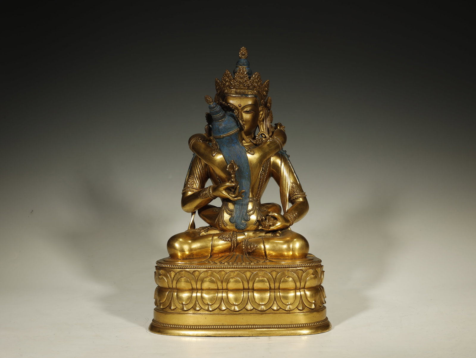 Qing Dynasty Gilt-Bronze Buddhist Yab-Yum Figure of a Tantric Deity in Union with Consort: A Fine Gilt-Bronze Yab-Yum Figure of a Tantric Deity in Union with Consort. Chinese/Tibet, Qing Dynasty. Height 35.5 cm × Base Length 23 cm × Base Width 15.5 cm. Description: Height 35.5 cm × Base 