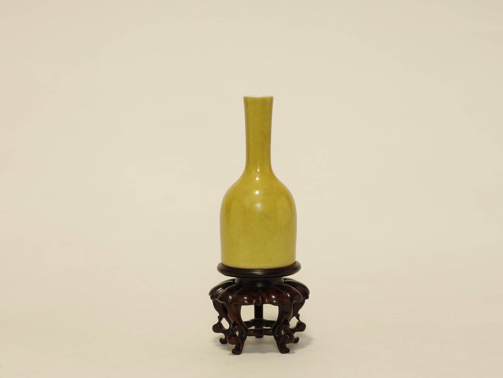 Qing Dynasty Yellow-Glazed 'Rattling' Zun Vase: Qing Dynasty Yellow-Glazed 'Rattling' Zun Vase....Chinese, Qing Dynasty....Height 12 cm.....Description: A yellow-glazed porcelain zun-form vase of archaistic bronze-vessel shape, with a trumpet neck 