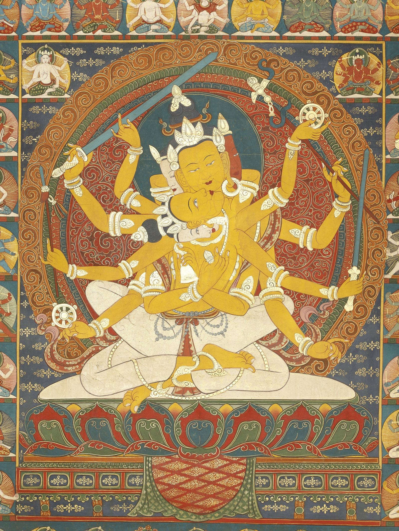 Qing Dynasty Thangka of Guhyasamaja: A Painted Thangka of GuhyasamajaChina/Tibet, Qing Dynasty38.2 x 27.2 in. (97 x 69 cm)Description: A hand-painted thangka depicting Guhyasamaja in union with his consort, deep blue in complexion with m