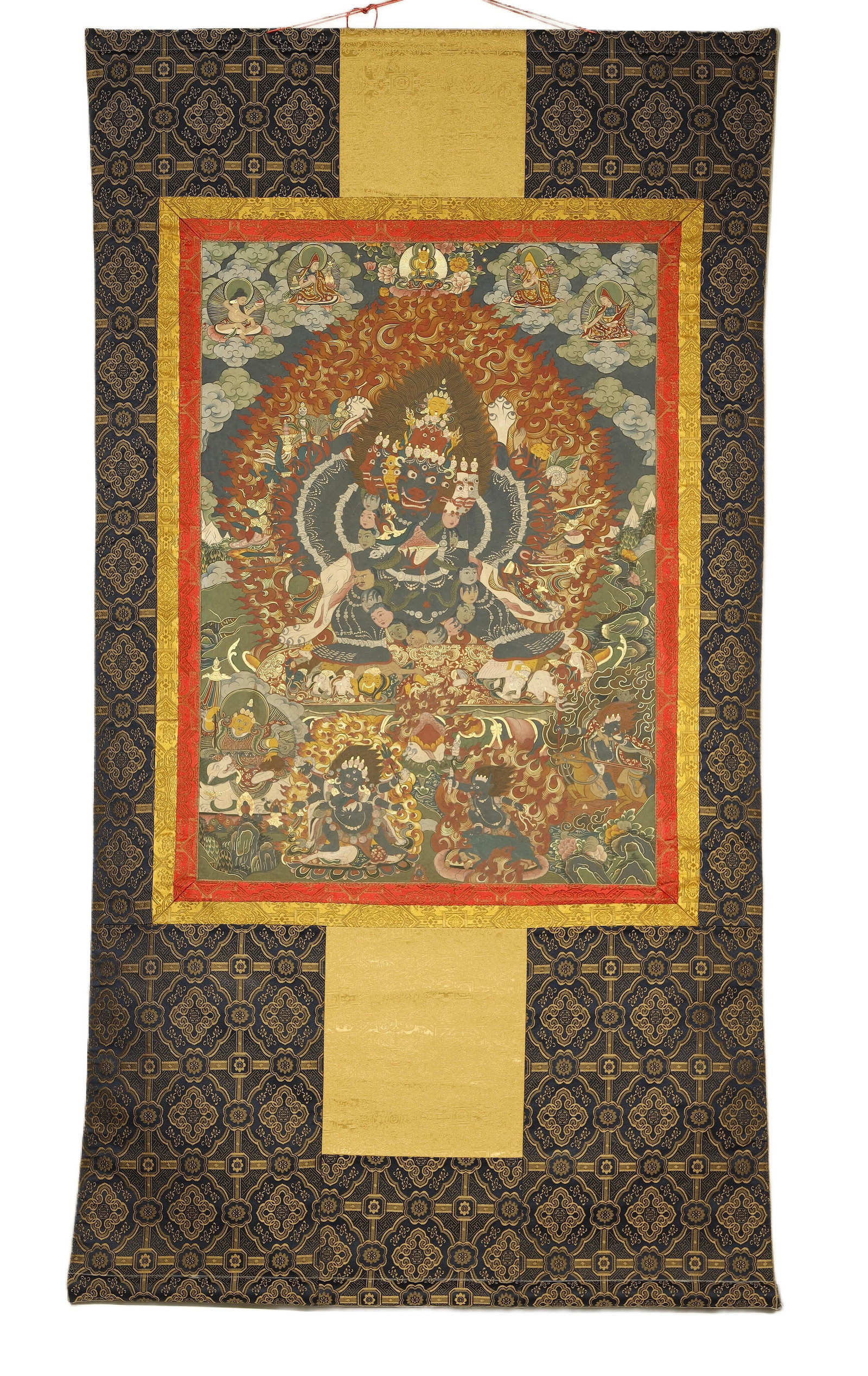 Qing Dynasty Thangka of Vajrabhairava (Yamantaka): A Painted Thangka of Vajrabhairava (Yamantaka)China/Tibet, Qing Dynasty35.4 x 24.8 in. (90 x 63 cm)Description: A hand-painted thangka of the wrathful deity Vajrabhairava (Yamantaka), shown with a buf