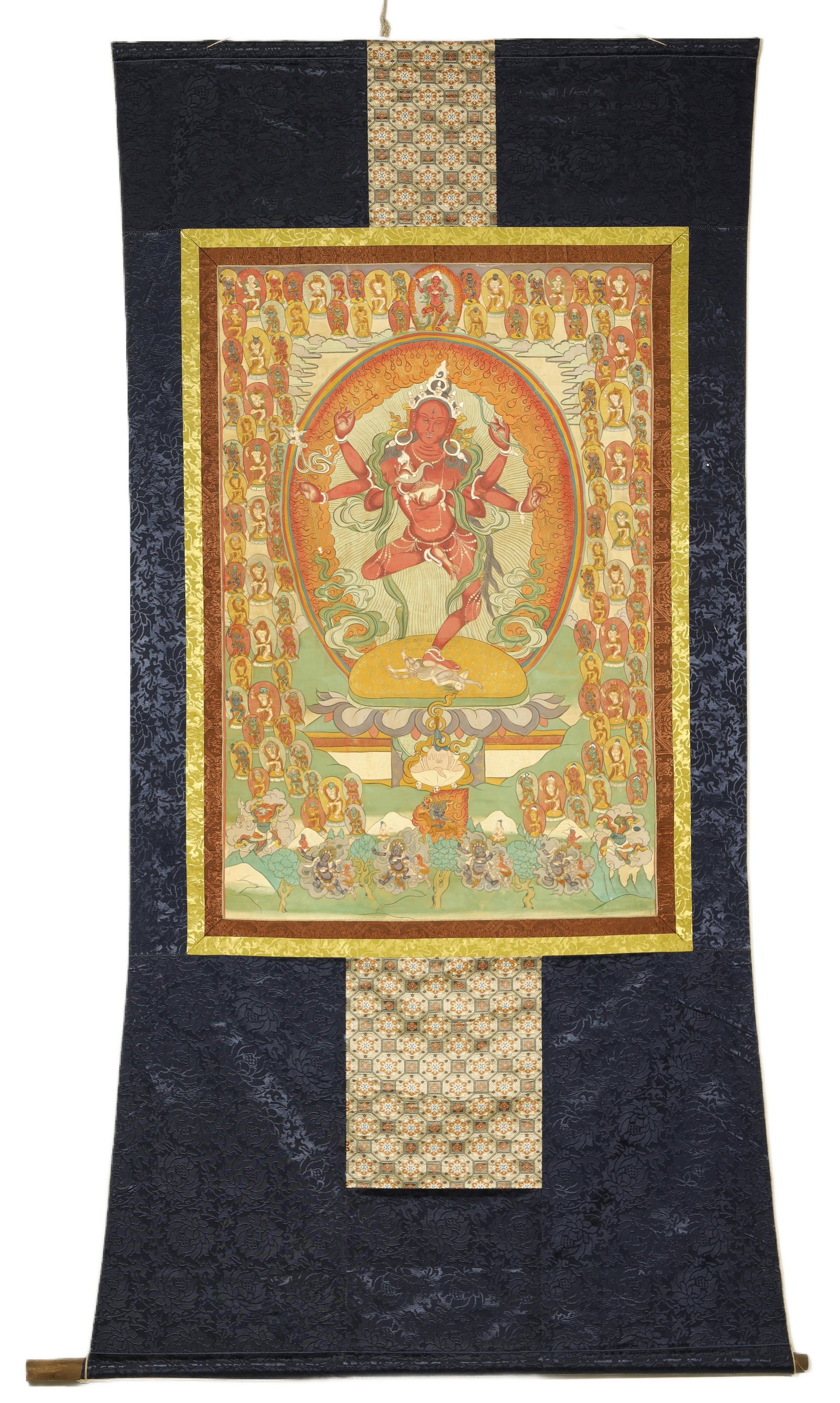 Qing Dynasty Thangka of Six-Armed Avalokiteshvara: A Painted Thangka of Six-Armed AvalokiteshvaraChina/Tibet, Qing Dynasty34.3 x 22.4 in. (87 x 57 cm)Description: A hand-painted thangka of a six-armed form of Avalokiteshvara, rendered in a dancing pos