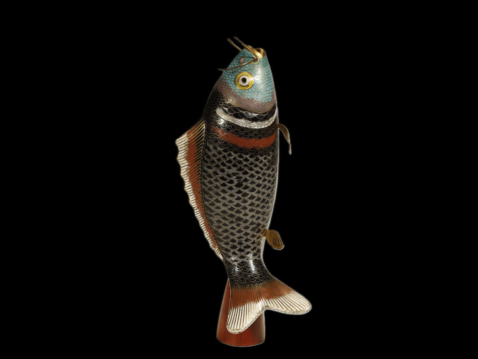Qing Dynasty Cloisonné Enamel Model of a Carp: A Cloisonné Enamel Model of a CarpChina, late Qing Dynasty/Republic PeriodHeight: 15 in. (38 cm)Description: A cloisonné enamel model of a carp, naturalistically modeled leaping upright with curved 