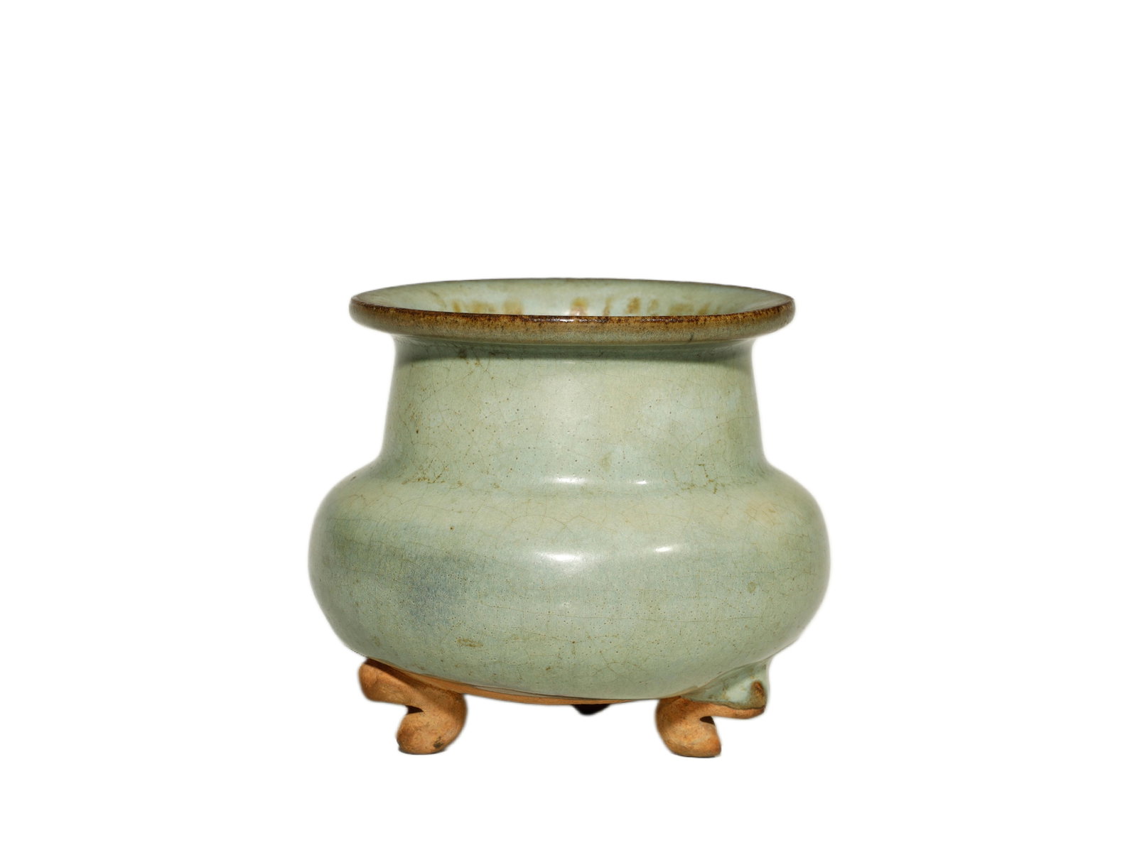 Qing Dynasty n Celadon-Glazed Tripod Censer: A Celadon-Glazed Tripod CenserChina, Qing DynastyHeight: 4.9 in. (12.5 cm); diameter 4.5 in. (11.5 cm)Description: A porcelain censer of compressed globular form raised on three small scroll feet, the