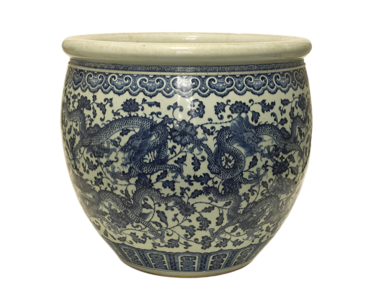 Qing Dynasty Blue-and-White 'Dragon' Fishbowl: A Blue-and-White 'Dragon' Fishbowl...China, Qing Dynasty...Height: 18.9 in. (48 cm); diameter 20.5 in. (52 cm)...Description: A massive blue-and-white porcelain fishbowl of deep rounded form with an e