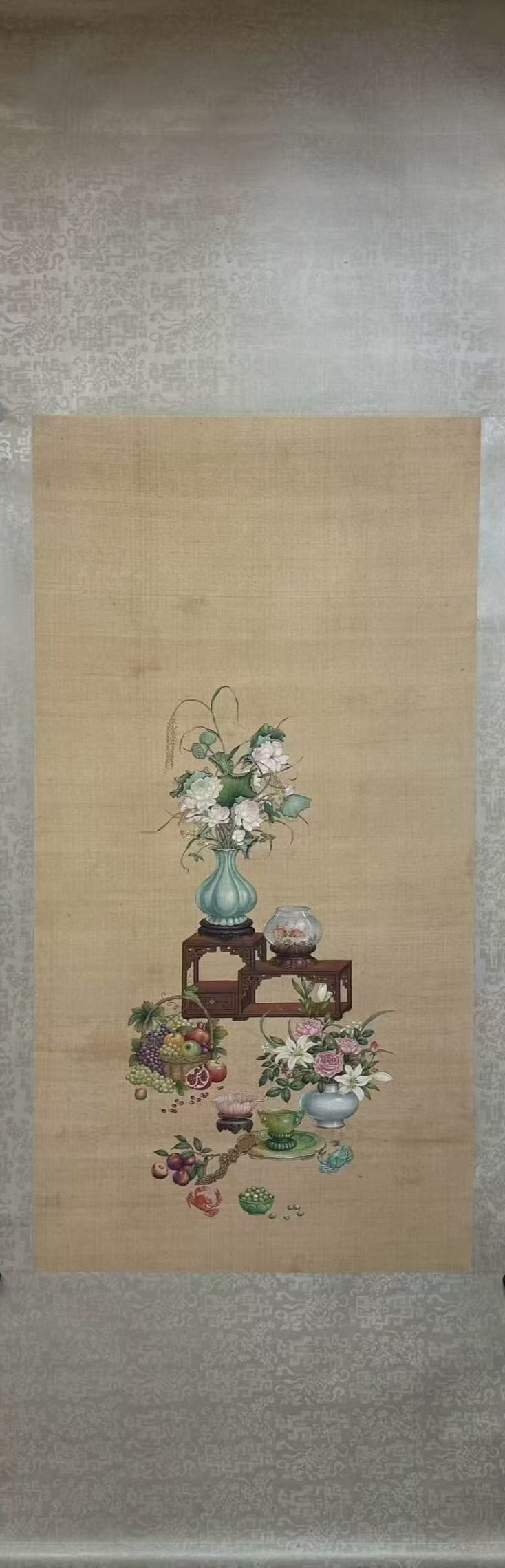 Yuan Dynasty, "Antiquities" Painting: Yuan Dynasty, "Antiquities" PaintingYuan Dynasty StyleLength: 160cm Width: 67cmDescription: A hanging scroll painting depicting an arrangement of vases holding flowering branches, a basket of grapes a