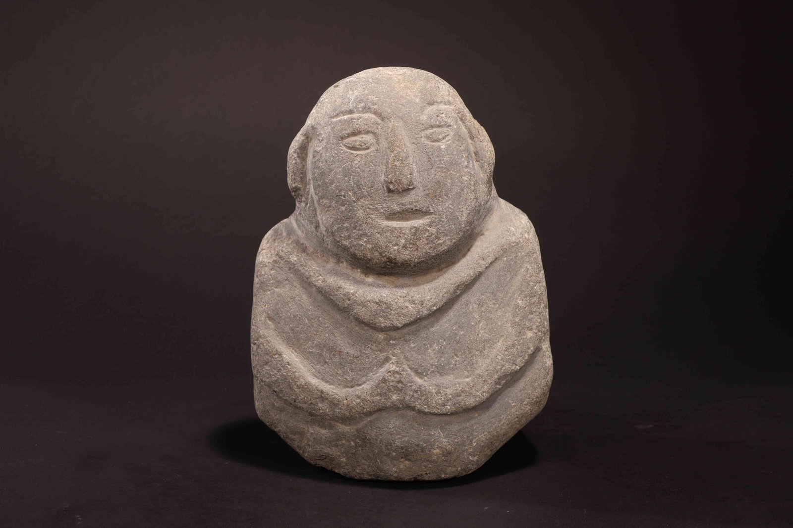 Neolithic Hongshan Culture Spirit-Figure Ornament: Neolithic Hongshan Culture Spirit-Figure OrnamentNeolithic Hongshan CultureHeight: 19cm Width: 15cm Weight: 3484gDescription: A carved stone ornament depicting a stylized anthropomorphic bust, the rou