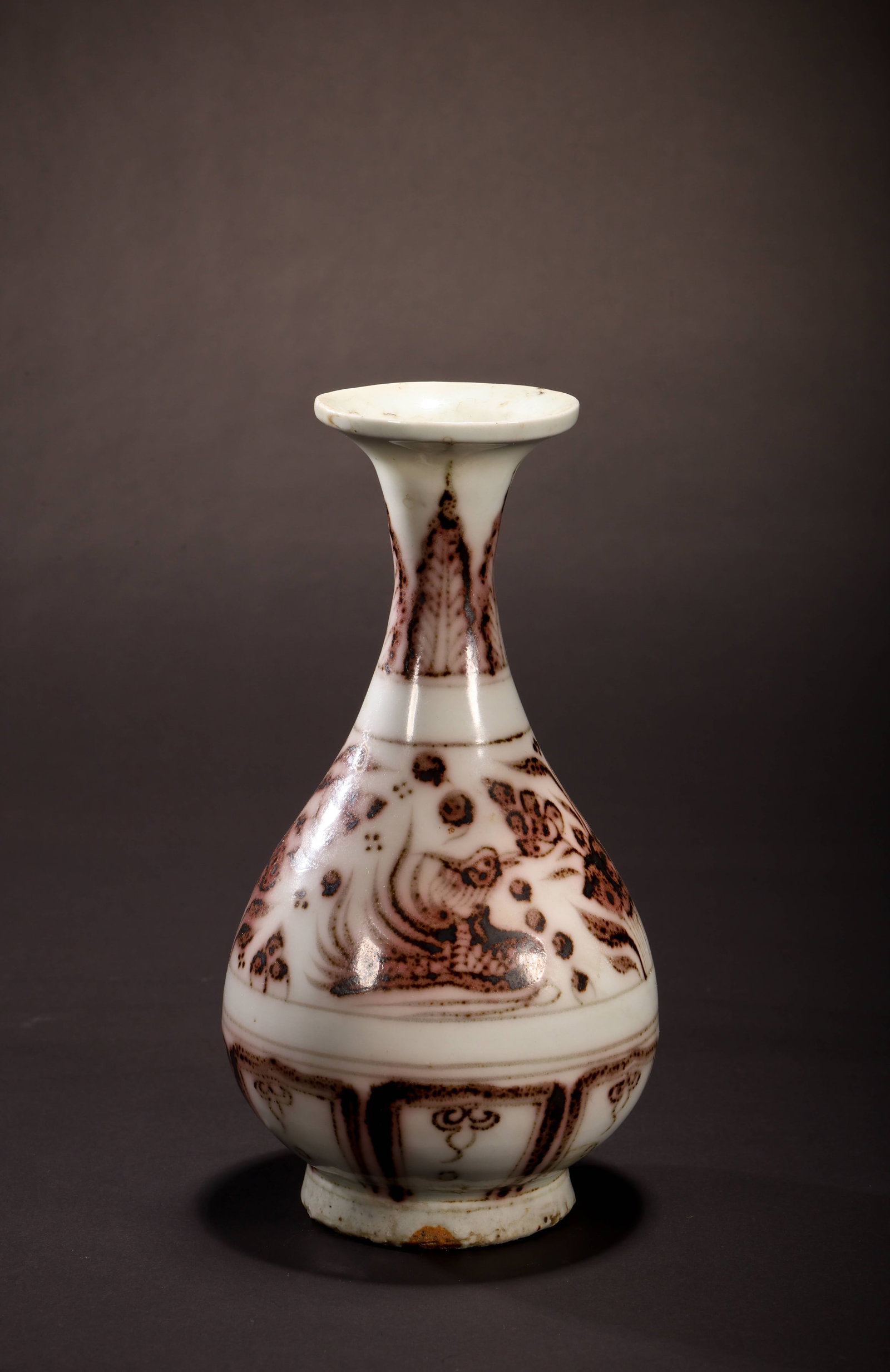 Underglaze-Red Yuhuchun Vase: Underglaze-Red Yuhuchun VaseYuan/Ming Dynasty StyleHeight: 16cm Base / Foot: 5.5cmDescription: A pear-shaped porcelain vase (yuhuchunping) with a slender neck rising to a flared, everted rim, painted 