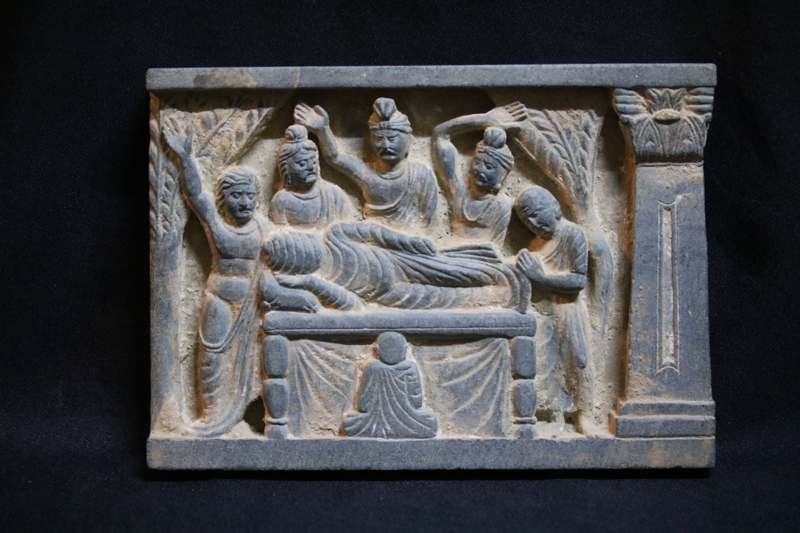 Gandhara Green Schist Relief Panel of the Parinirvana: "Gandhara Green Schist Relief Panel of the Parinirvana....Gandhara Region... Kushan Period, 2nd-3rd Century AD....Height: 18cm Width: 26cm....Description: Carved in low relief from green schist, this 