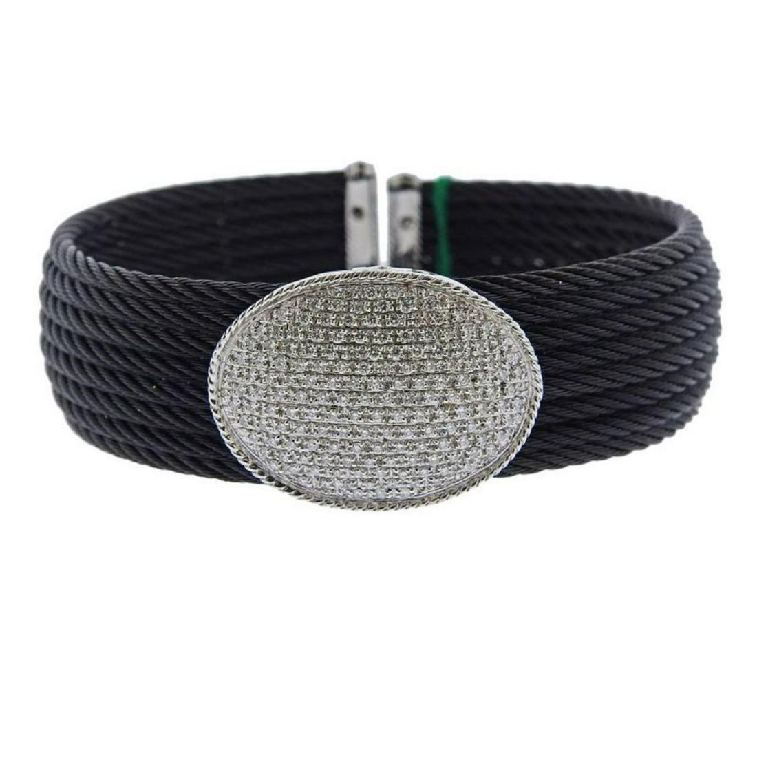 Charriol Gold Diamond Celtic Noir Cuff Bracelet: Brand new Charriol black cable 18K gold and diamond bracelet . Retail $6550. Bracelet will fit approx. 7" wrist / 23mm at the widest point. Marked Steel, Au750, Charriol. Weight - 41.8 grams.