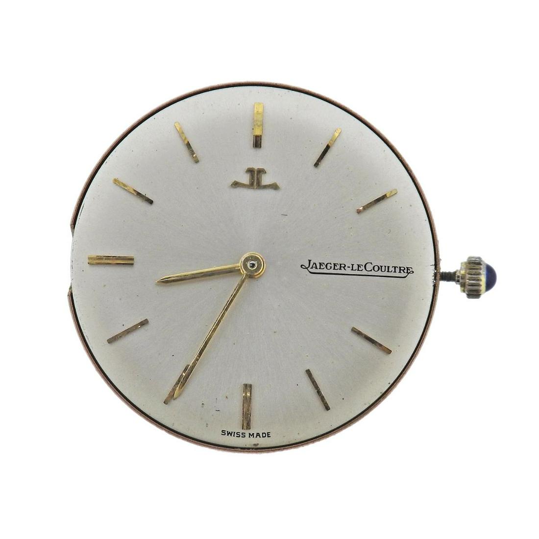 Vintage Jaeger LeCoultre Manual Wind Watch Movement: Vintage Jaeger LeCoultre Manual Wind Watch. No glass/crystal, dial is exposed. Base metal. Measures 30mm excluding crown. Watch features a Sapphire Cabochon Crown. Running order. Functions- hours, min