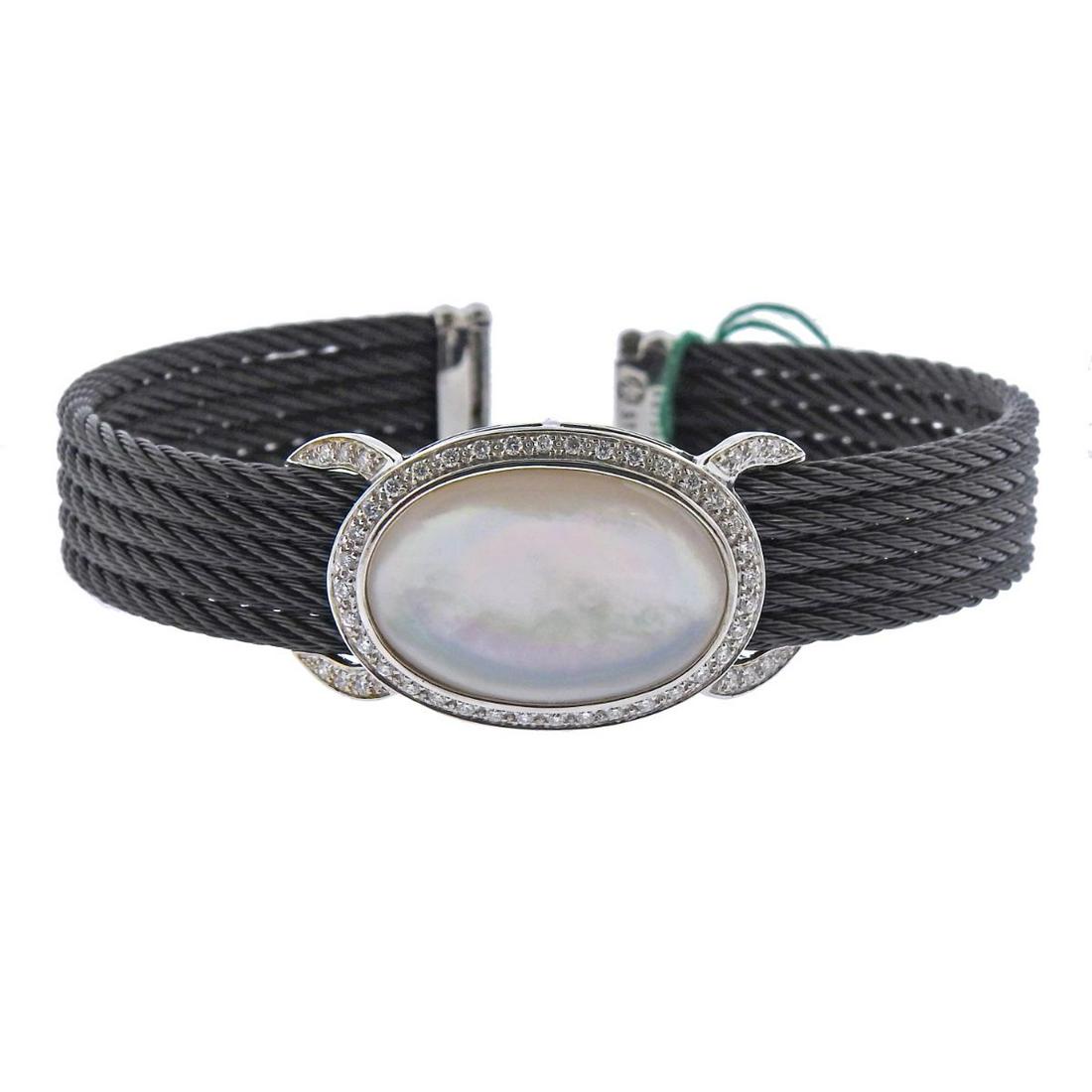 Charriol Celtic Noir Gold Steel MOP Diamond Bracelet: New with tag, Charriol cuff bracelet from Celtic Noir collection, with center mother of pearl and approx. 0.44ctw diamonds. Bracelet will fit up to 7.75" wrist and is 18mm wide. Marked: Charriol, Au75
