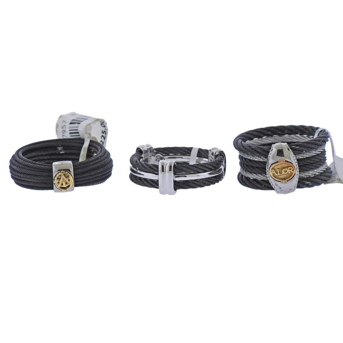 Charriol Alor Steel Gold Band Ring Set of 3: Set of 3 new with tags rings, one by Charriol, and two by Alor. In 18k gold and steel. Ring sizes - 6.75, 6 and 9. Weight - 19 grams.