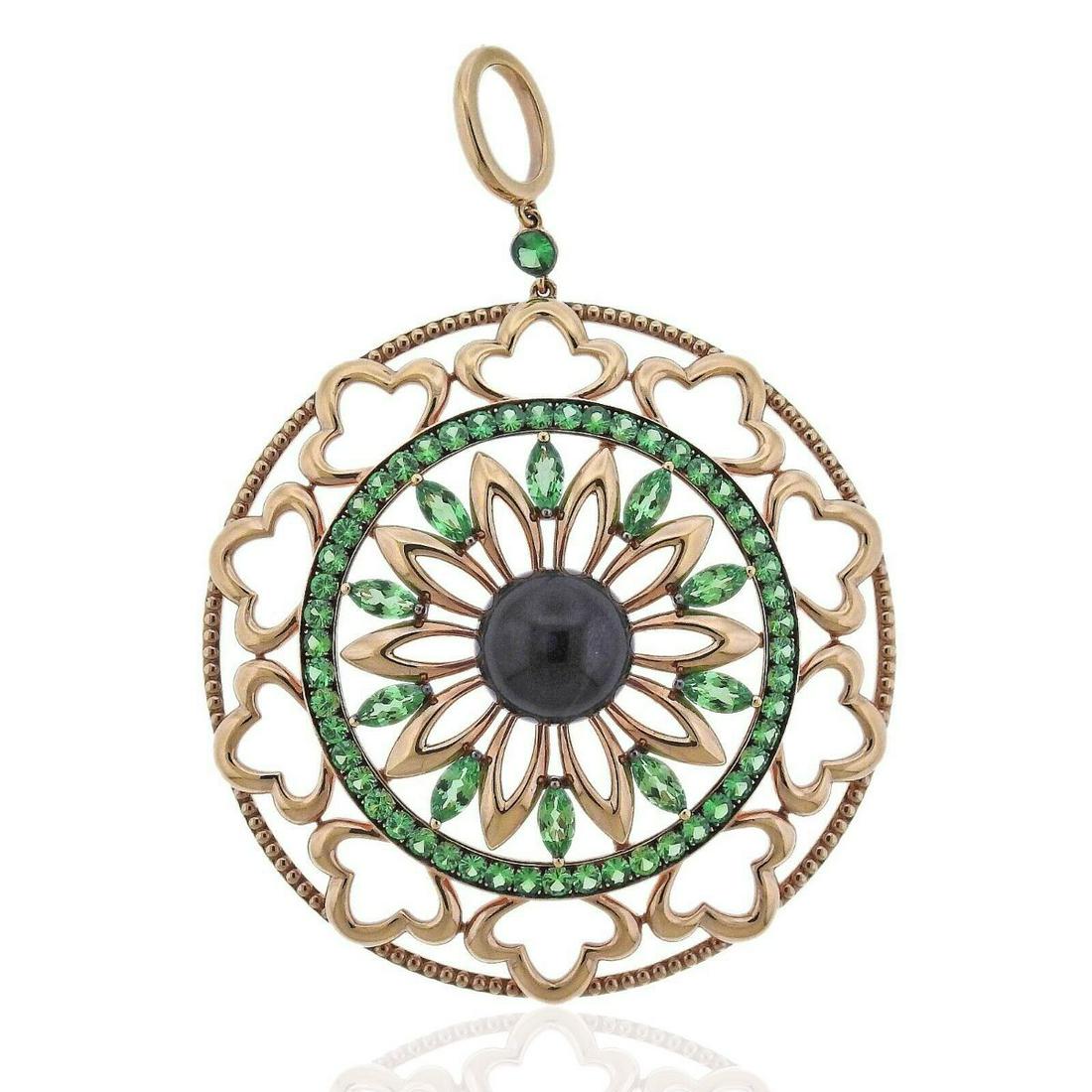 Bucherer 18K Gold Amethyst Tsavorite Pendant: Metal : 18k Rose Gold Designer : Bucherer Gemstone : Amethyst 12ct, Tsavorite 4.60ctw Measurements : Pendant is 50mm or 2" in diameter. Chain pictured on model is for size reference only. Does