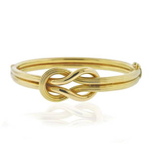 Lalaounis Greece 18k Gold Hercules Knot Bracelet: Metal  : 18k Gold  Designer  : Ilias Lalaounis  Gemstone  : None  Measurements  : Bracelet will fit approx. 6.75" wrist, knot is 15mm x 28mm  Marked:  : Ilias Lalaounis, 750, GR A21  Weight: