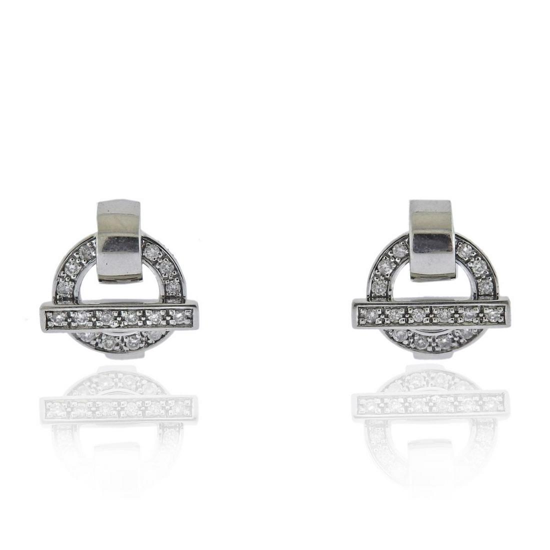 Guy Laroche 18k Gold Diamond Earrings: Metal : 18k Gold Designer : Guy Laroche Gemstone : Diamonds approx. 0.32ctw Measurements : Earrings are 17mm x 15mm Marked: : Guy Laroche, 18k PD Weight: 8.8 grams