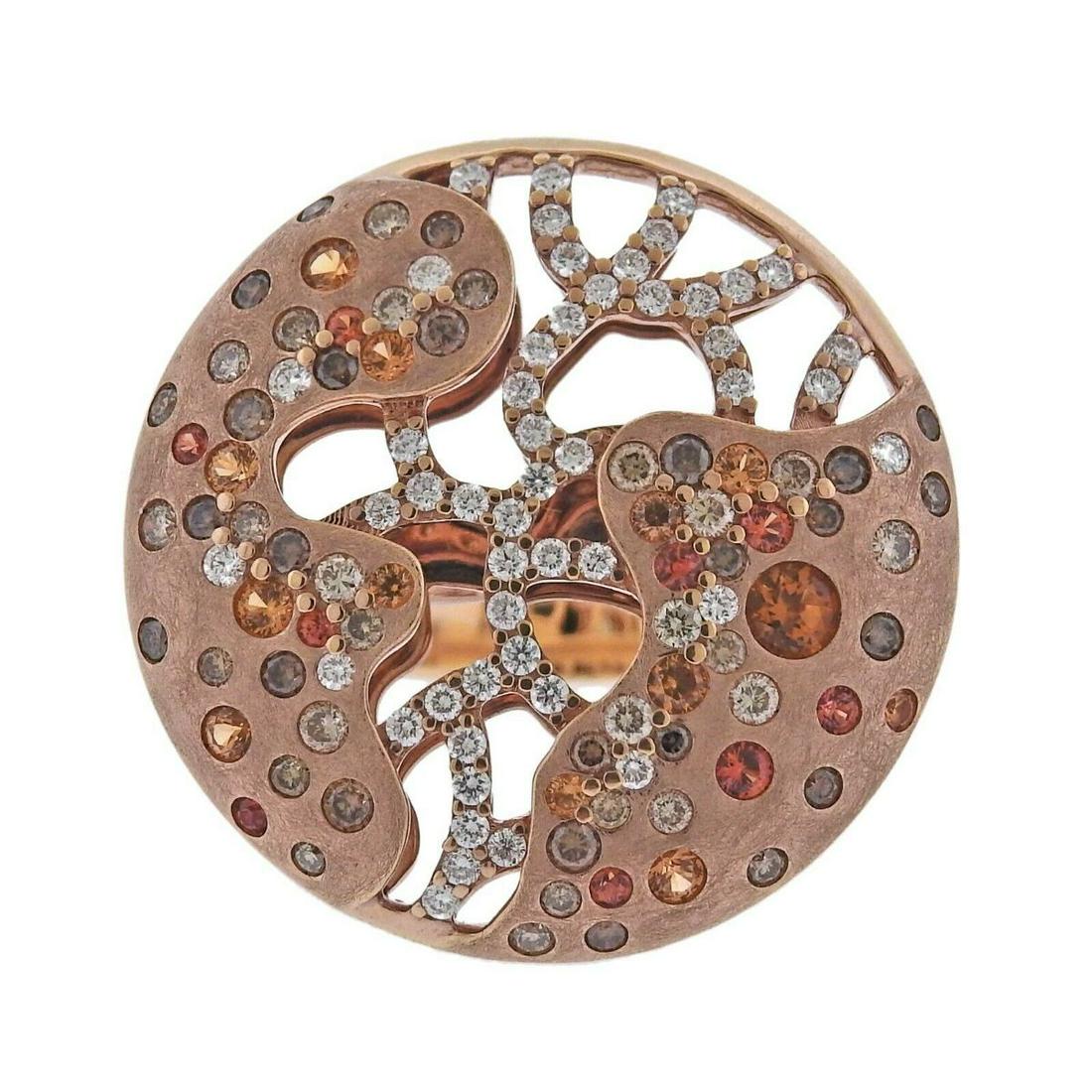 Bucherer 18K Gold Diamond Sapphire Citrine Cocktail Ring: Metal : 18k Rose Gold Designer : Bucherer Gemstone : Sapphire 0.56ctw, Citrine 0.10ctw, Diamonds 0.88ctw, Champagne diamonds 0.52ctw Measurements : Ring size 7, top is 28mm in diameter Marked: