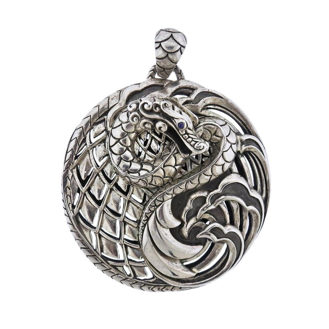 John Hardy Sterling Silver Dragon Sapphire Pendant: Metal : Sterling Silver Designer : John Hardy Gemstone : Sapphire eyes Measurements : Pendant is 50mm in diameter x 65mm with bale Marked: : JH 925 Weight: 50.2 grams