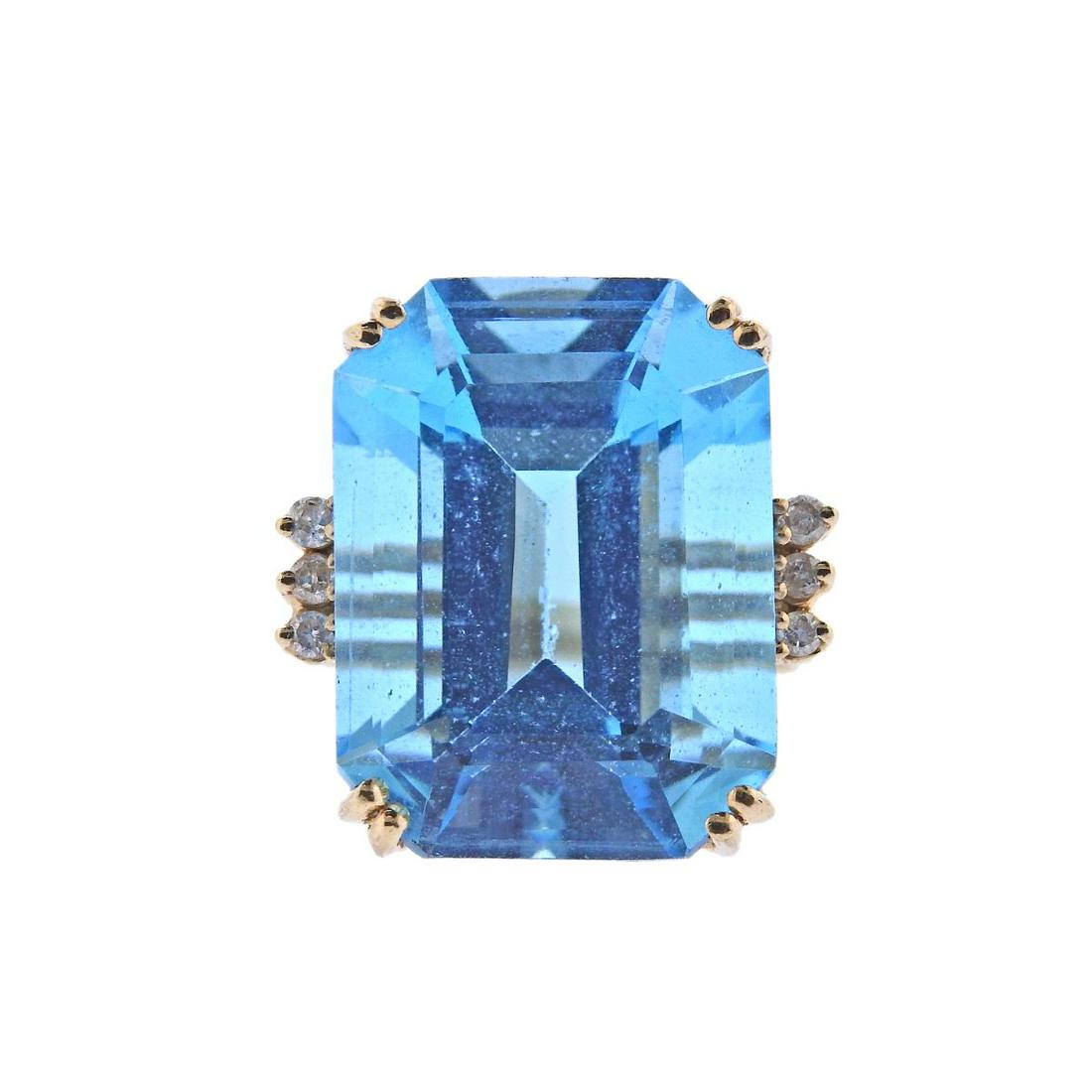 14k Gold Diamond Blue Topaz Ring: Metal : 14k Gold Designer : Not Signed Gemstone : Blue topaz - 20.2x 15.1x 1.2mm, Diamonds approx. 0.06ctw Measurements : Ring size 6, ring top is 20.1mm wide Marked: : CID 14k We