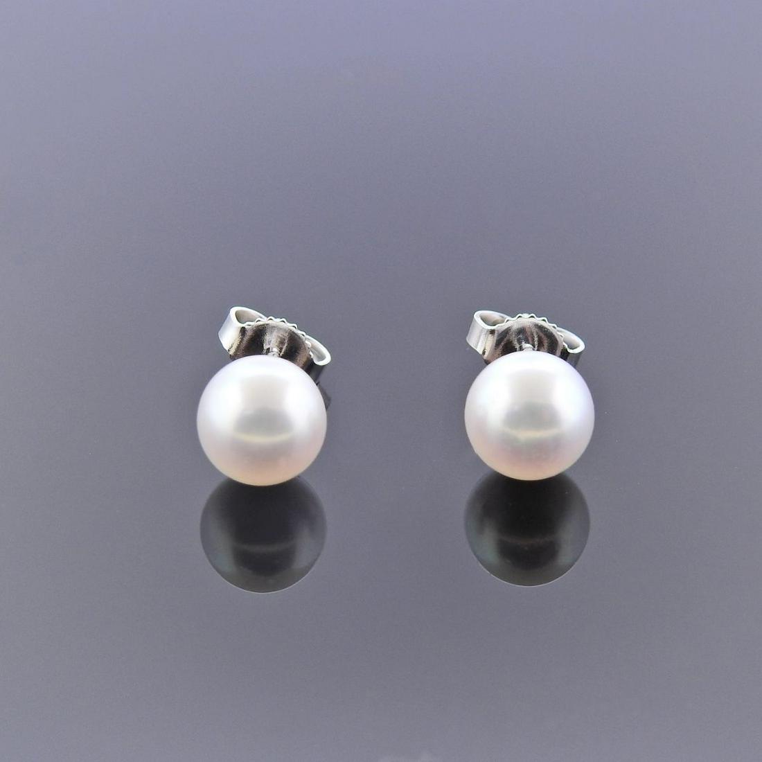 Mikimoto 18k Gold Pearl Stud Earrings: Metal : 18k Gold Designer : Mikimoto Gemstone : A+ pearls - 7.3mm Measurements : earrings are 7.3mm Marked: : 750, M hallmark Weight: 2 grams