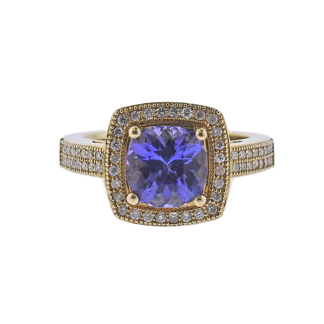 14k Gold Tanzanite Diamond Ring: Metal : 14k Gold Designer : Not Signed Gemstone : Tanzanite approx. 2.63ct, Diamonds approx. 0.30ctw Measurements : Ring size 7.25, top is 12.5 x 12.5mm Marked: : 14k Weight: 6.7 gr