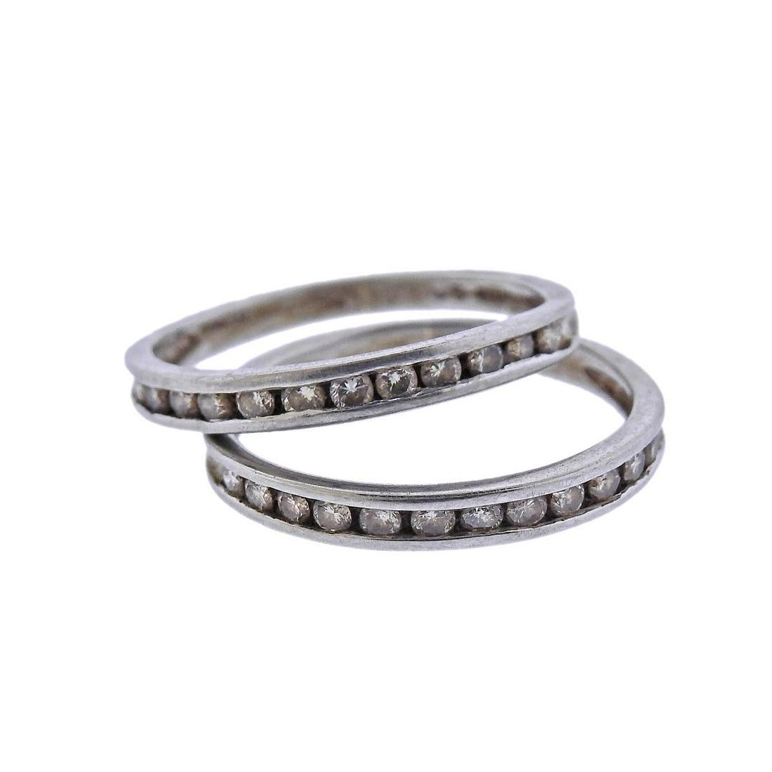Platinum Diamond Wedding Band Ring Set of 2: Metal : Platinum Designer : Not Signed Gemstone : Diamonds approx. 0.24ctw Measurements : Ring sizes 5.5 and 5.25, width 2.6mm Marked: : Am-6, pt900 Weight: 4.7 grams