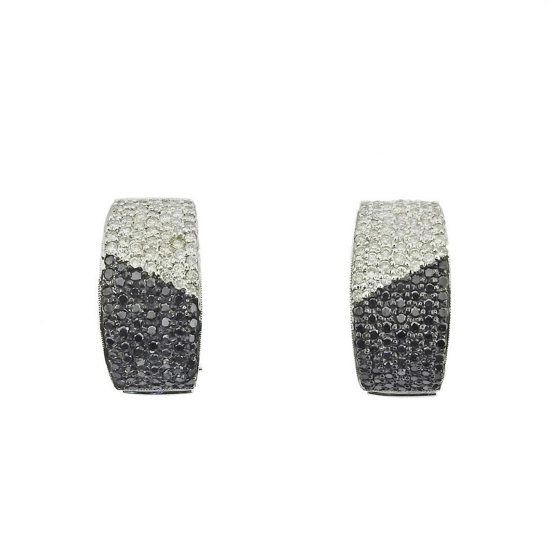 18k Gold Black White Diamond Half Hoop Earrings: Metal : 18k Gold Designer : Not Signed Gemstone : Black and white diamonds approx. 0.80ctw Measurements : Earrings are 22mm x 12mm Marked: : 750, 18k, FSG Weight: 8.5 grams