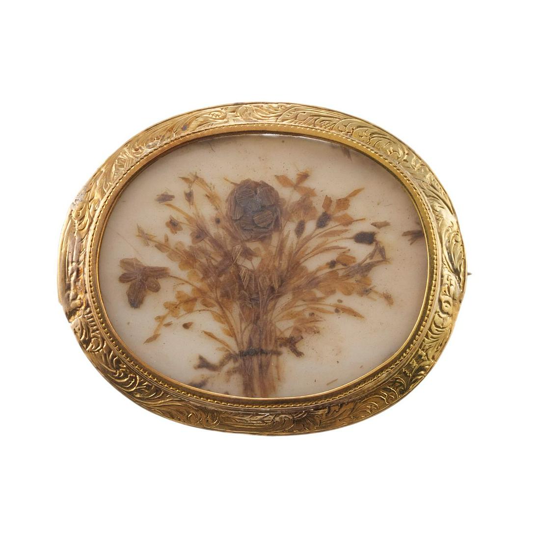Antique Gold Hair Locket Brooch: Metal : Gold Designer : Not Signed Gemstone : None Measurements : Brooch is 45mm x 36mm Marked: : Low karat gold Weight: 12.3 grams