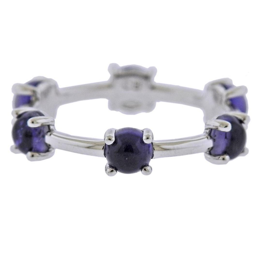 Bucherer Gold Iolite Ring: Metal : 18k White Gold Designer : Bucherer Gemstone : Iolite Measurements : Ring size - 6.5, ring is 4.2mm wide. Marked: : CB, 750 Weight: 2.2 grams.