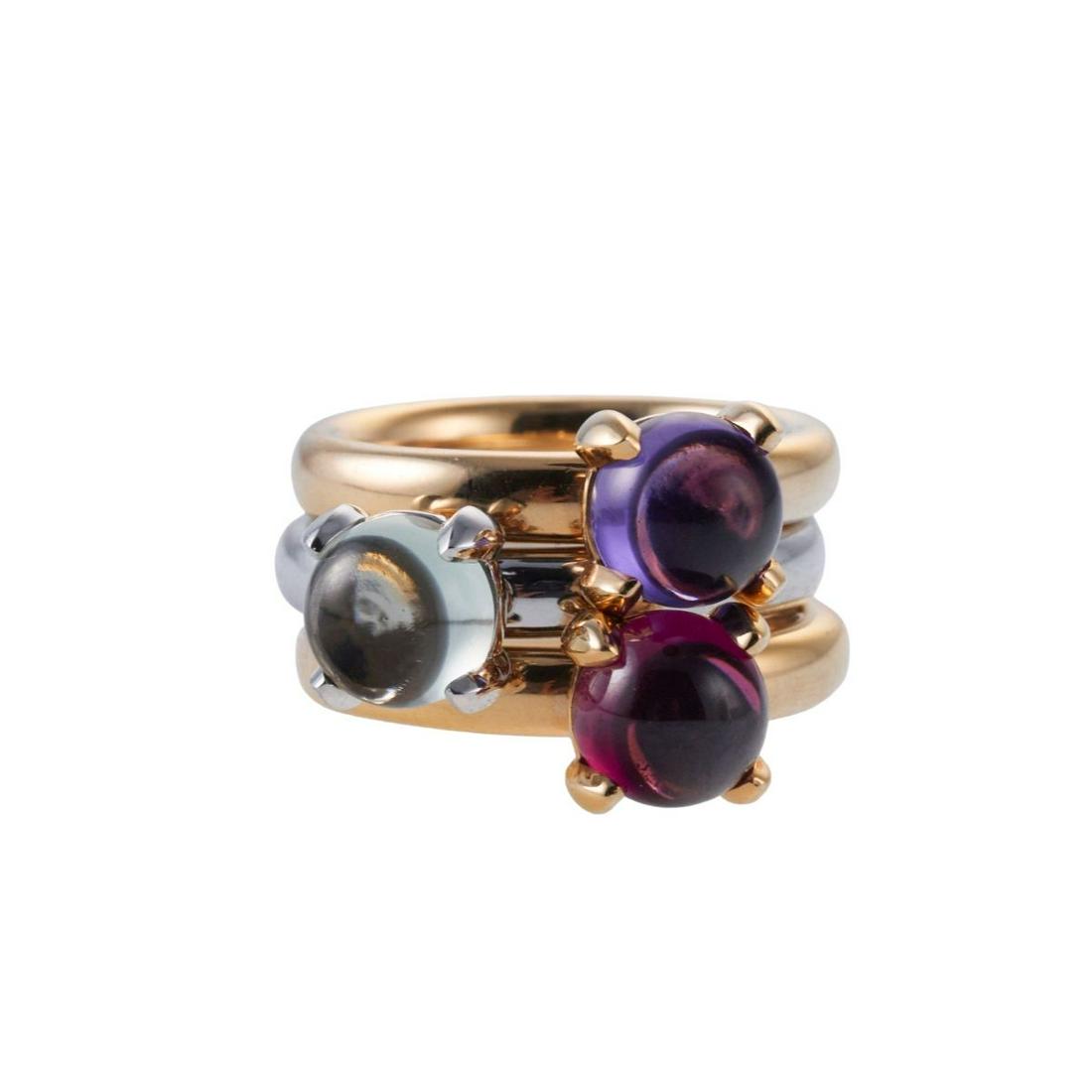 Bucherer 18k Gold Amethyst Quartz Rhodolite Stackable Ring Set: Metal : 18k Gold Designer : Bucherer Gemstone : Quartz, Amethyst, Rhodolite 8mm each Measurements : Ring size - 7.75 each Marked: : CB 750 Weight: 31.9 grams