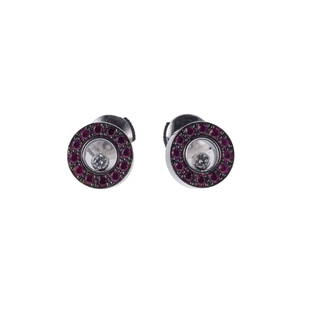 Chopard Happy Diamonds 18k Gold Ruby Stud Earrings: Metal : 18k Gold Designer : Chopard Gemstone : Rubies, 0.50ctw, Diamonds 0.11ctw. Measurements : Earrings are 10mm in diameter. Retail $3583. Marked: : Chopard, 750, Serial