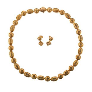 Lalaounis Greecek 18k Gold Necklace Earrings Set: Metal : 18k Gold Designer : Ilias Lalaounis Gemstone : None Measurements : Necklace is 15.75" long and 10mm wide. Earrings are 18mm x 10.7mm. Marked: : Greece, Lalaounis, Maker;s