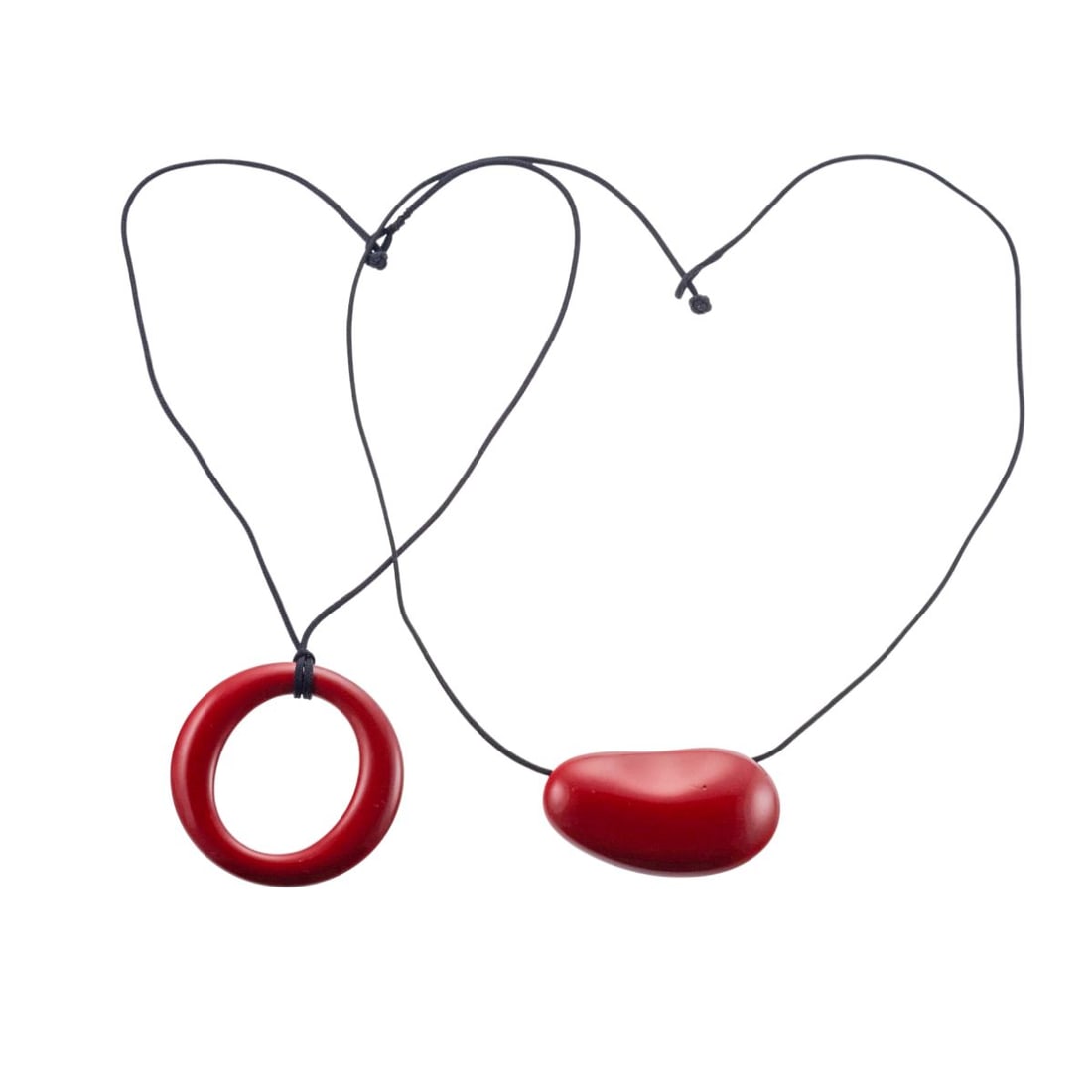 Tiffany & Co Elsa Peretti Resin Sevillana O Bean Pendant Necklace Lot of 2: Metal : Resin/Cord Designer : Elsa Peretti for Tiffany & Co Gemstone : None Measurements : Necklaces are 15" and 21" long, bean is 50mm x 30mm, O is 50mm in diameter. Marked: : Tiffany & Co