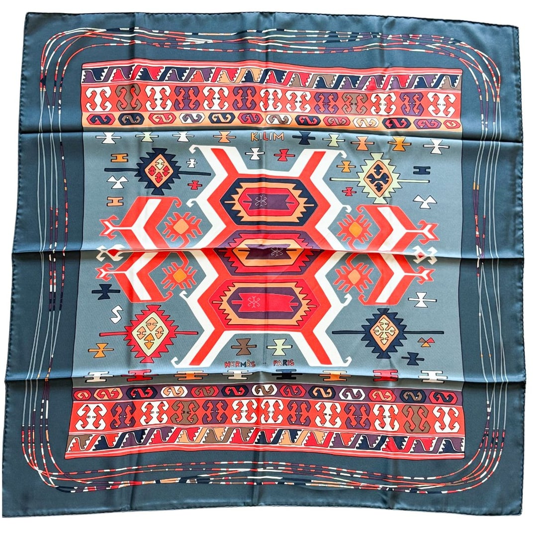 Hermes Kilim by Dmitri Ribaltchenko Limited Edition Silk Scarf: Hemes silk scarf designed Kilim by Dmitri Ribaltchenko. Measurements of the scarf leanth is 35" and width - 35" . Marked Hermes Paris, Made in France 100% silk. Exellent condition.