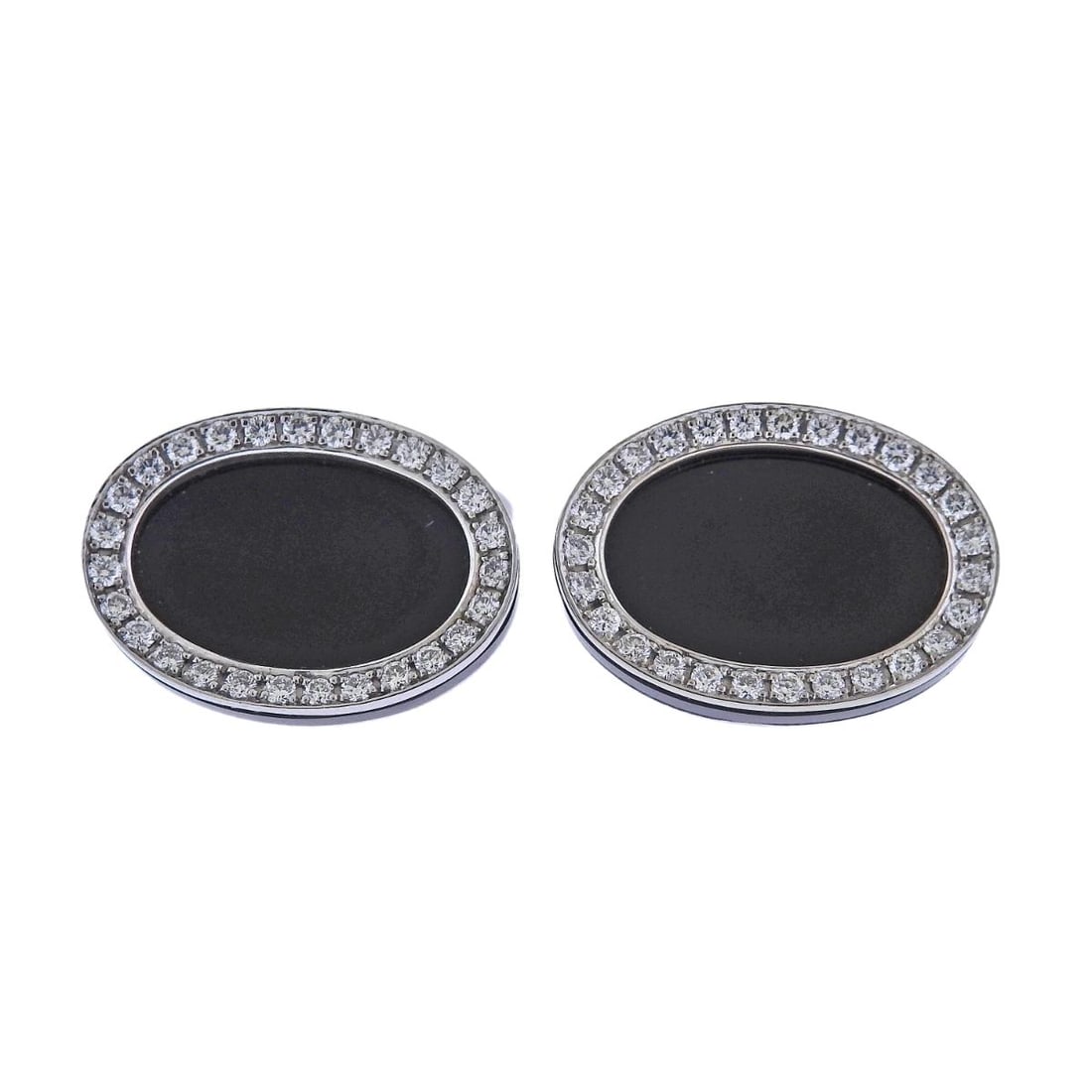 Bucherer Gold Diamond Onyx Oval Cufflinks: Metal : 18k Gold Designer : Bucherer Gemstone : Set with 0.54ctw G/VS diamonds and onyx Measurements : Cufflink top is 18mm x 14mm Marked: : CB, 750 Weight: 13 grams