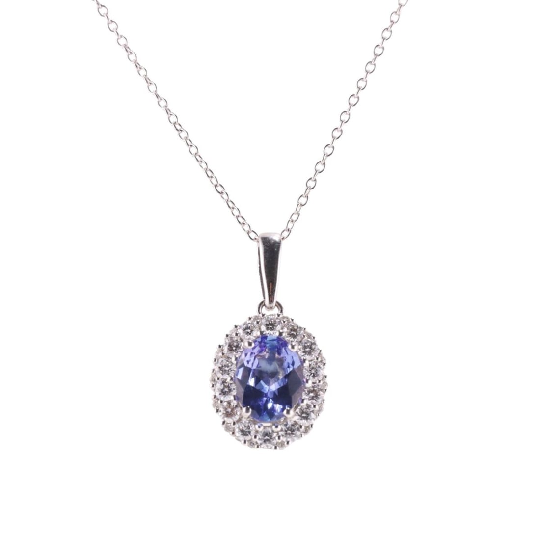 Kallati Gold Tanzanite Diamond Pendant Necklace: Metal : 9k Gold Designer : Kallati Gemstone : Tanzanite 8mm x 6.2mm, Diamonds approx. 0.45ctw. Measurements : Necklace is 18" long, Pendant is 21mm x 11mm. Marked: : Kallati, 9k, 375.