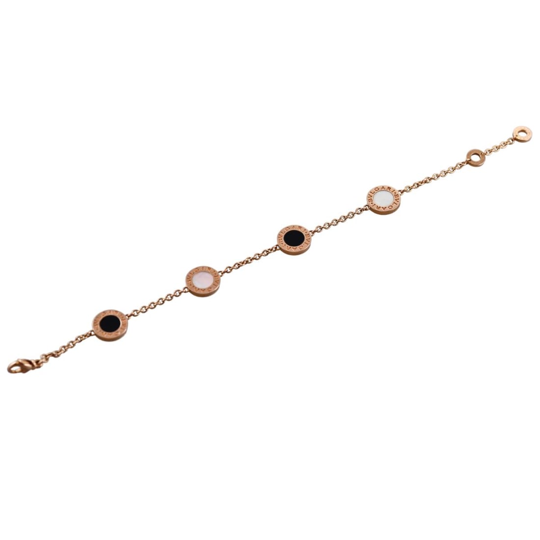 Bvlgari Bulgari 18k Rose Gold Onyx MOP Bracelet: Metal : 18k Rose Gold Designer : Bvlgari Gemstone : MOP, ,Onyx. Measurements : Bracelet is 7 3/8" long end to end, circles are 11mm. Marked: : Bvlgari, Italian mark, made in Italy, 750. <