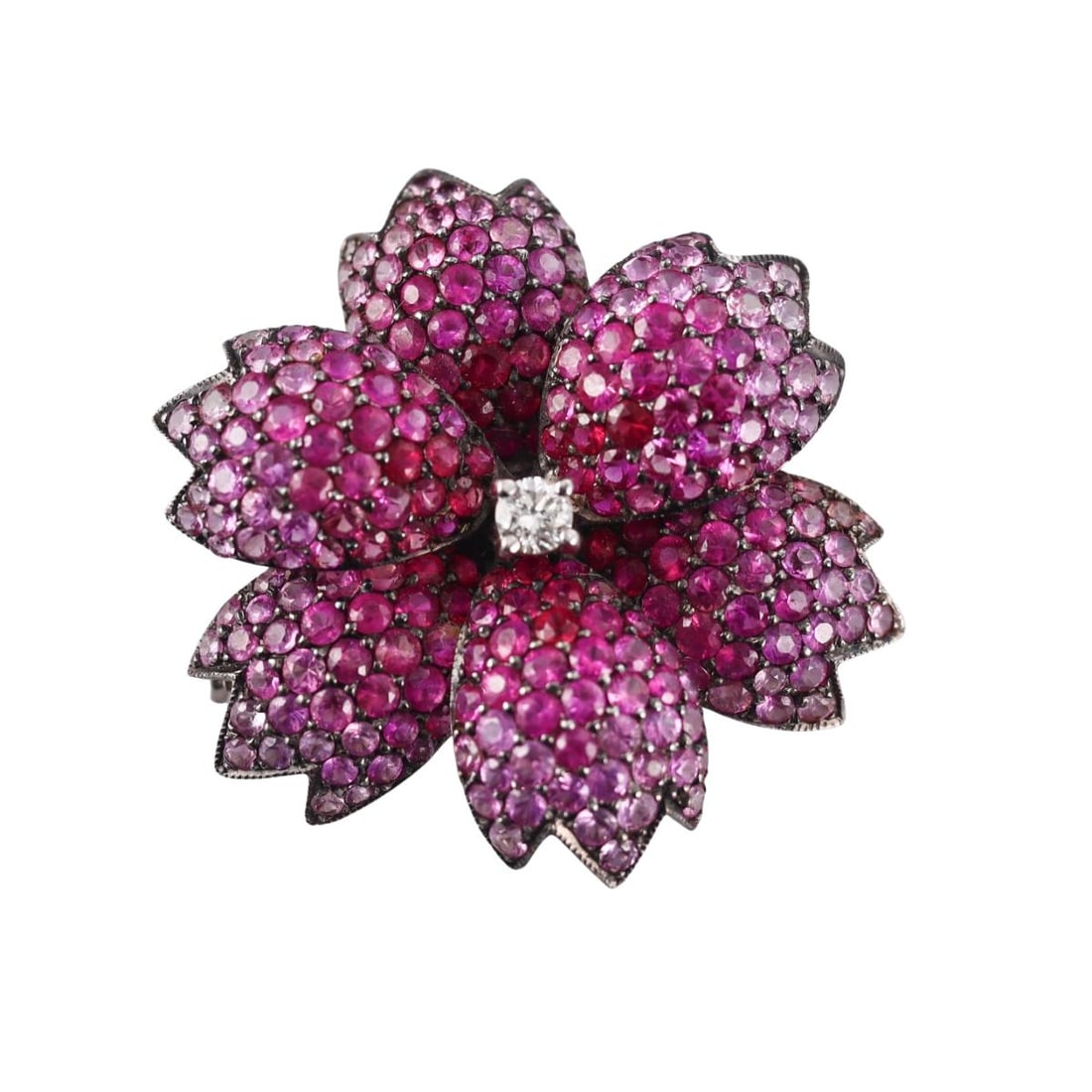 18k Gold Pink Sapphire Diamond Flower Brooch Pendant: Metal : 18k Gold Designer : Not Signed Gemstone : Pink sapphires, Diamond approx. 0.08ct. Measurements : Brooch is 32mm x 28mm. Marked: : Tested 18k. Weight: : 10 grams