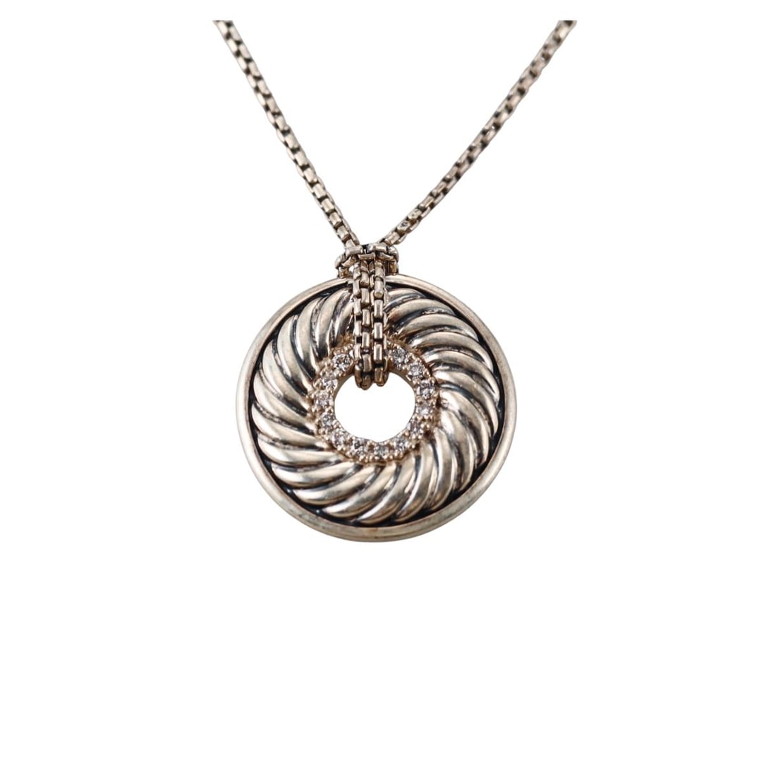 David Yurman Cookie Silver Diamond Pendant Box Chain Necklace: Metal : Sterling Silver Designer : David Yurman Gemstone : Diamonds approx. 0.07ctw. Measurements : Chain is 17" long, pendant is 19mm in diameter. Marked: : DY 925 . Weigh