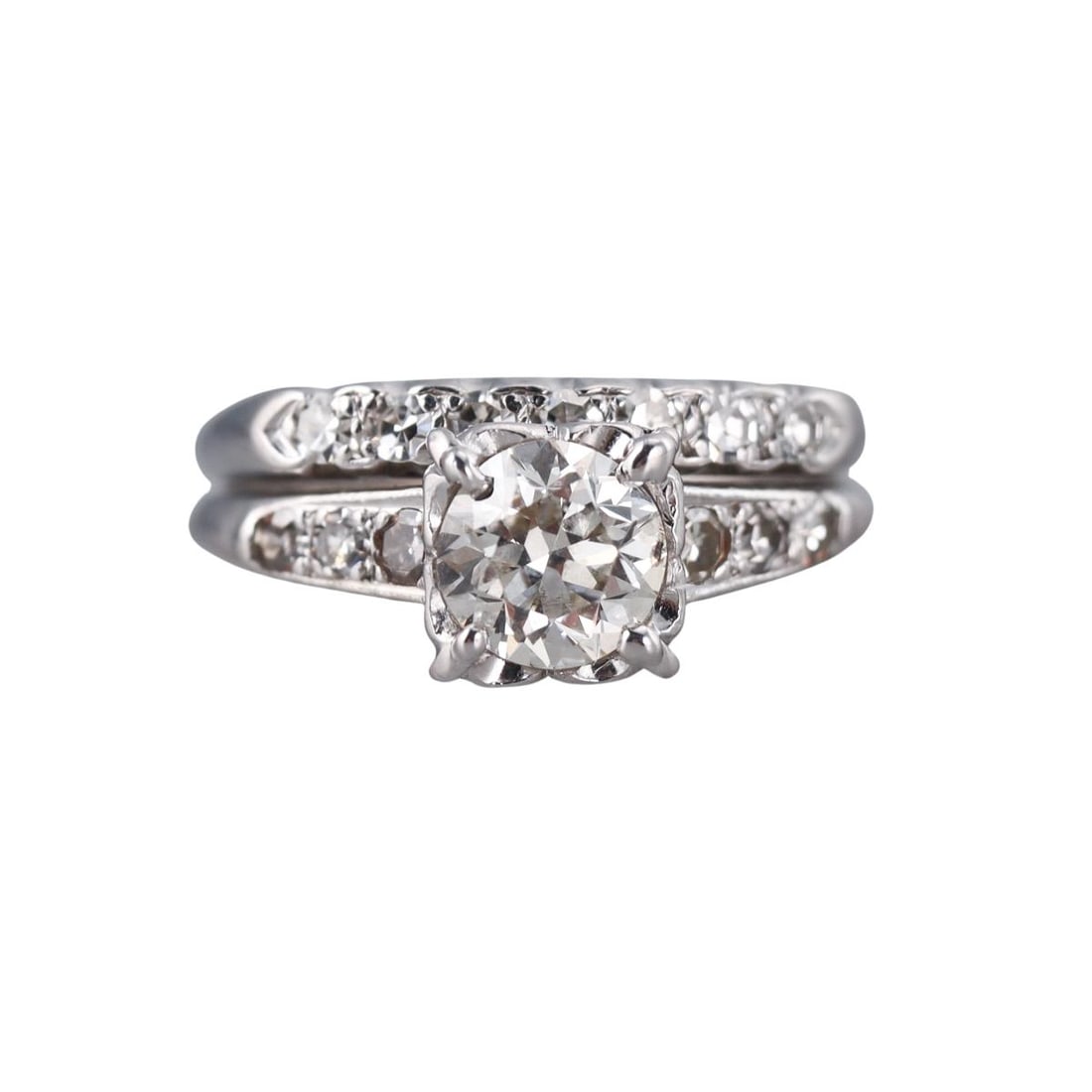 Midcentury Platinum Old European Diamond Engagement Ring: Metal : Platinum Designer : Not Signed Gemstone : Center OEC diamond approx. 0.96ct VS-SI1/H, Side stones approx. 0.40ctw. Measurements : Ring size 6. Two rings are soldered together. Mark
