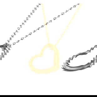 Tiffany & Co Elsa Peretti 18k Gold Open Heart Pendant Necklace: Metal : 18k Yellow Gold Designer : Tiffany & Co Elsa Peretti Gemstone : None Measurements : Necklace is 16" long, pendant is 15mm x 13mm. Marked: : Tiffany & Co, Peretti, 18k. 